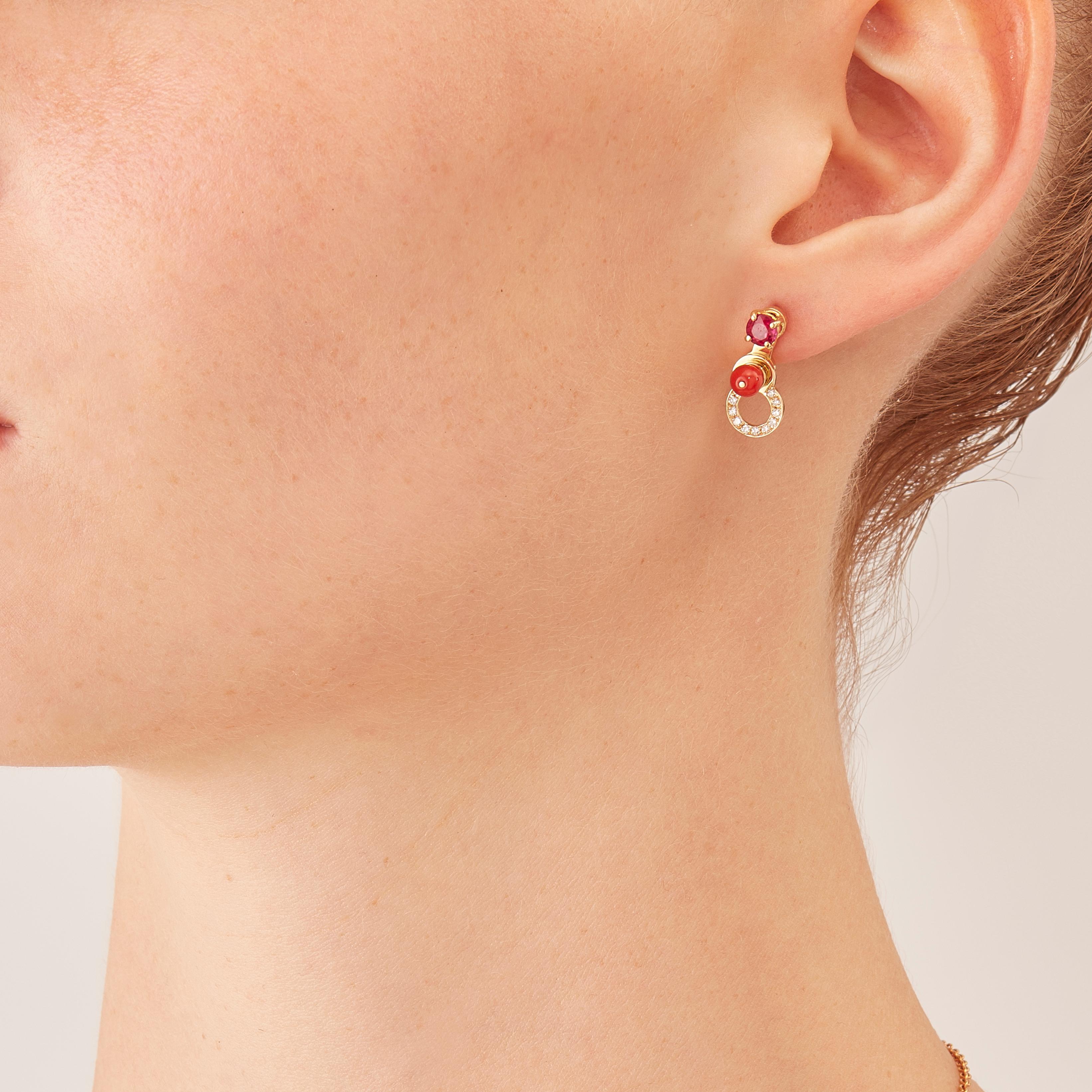 Made by hand in Nathalie Jean's Milan atelier, Microcosmos drop earrings, are devised as a game, a construction or a sophisticated aerial mobile. Shapes attached to rings dangle lightly on the ear, their geometry pierced by diamonds (0,11 carats),