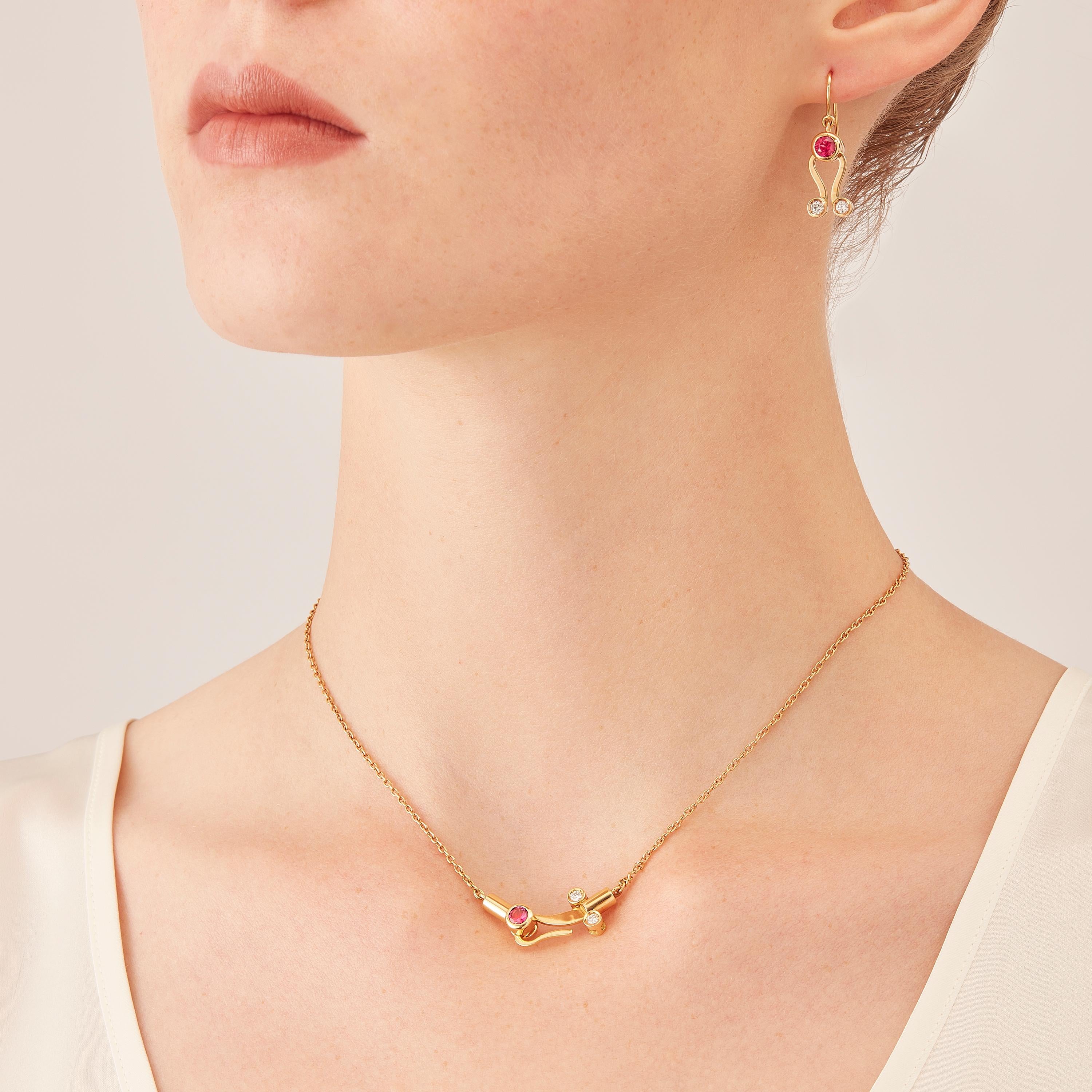 Micro Pendant and Micro Earrings in 18 karat rosé gold, a warm, sophisticated color close to yellow gold, from the Microcosmos Series, devised as a game, a construction or a sophisticated aerial mobile. Shapes attached to gold settings pivot