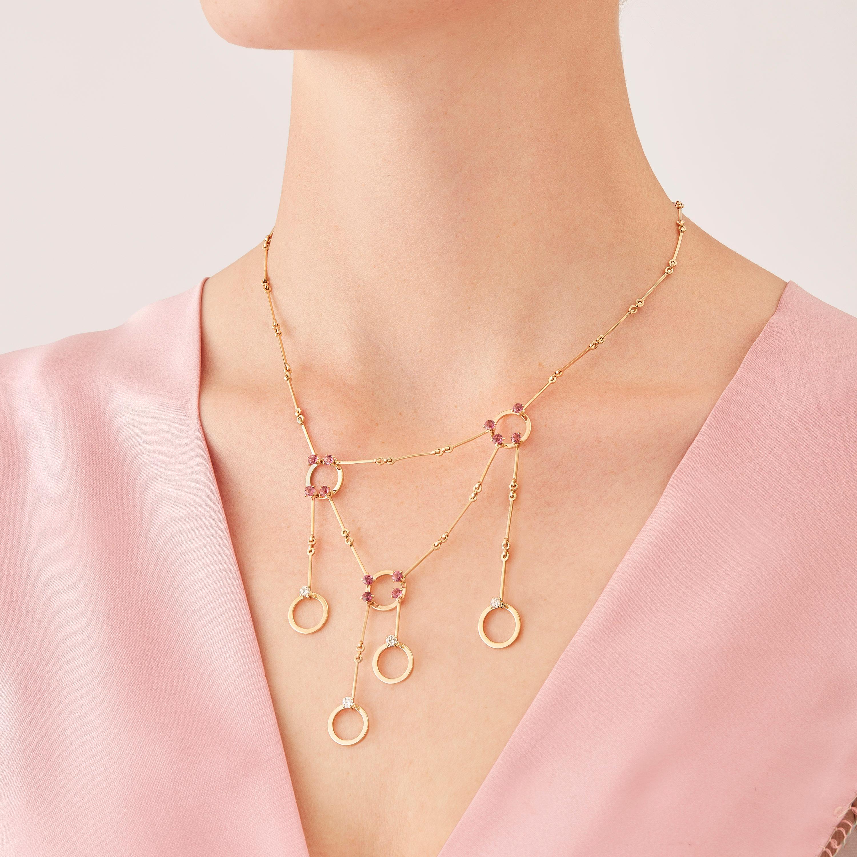 Made by hand in the Milanese atelier of Nathalie Jean, the limited edition Hoi An necklace is a graceful composition of articulated rings and bars in rosé gold, a warm, sophisticated color close to yellow gold. Miniature articulations are cleverly