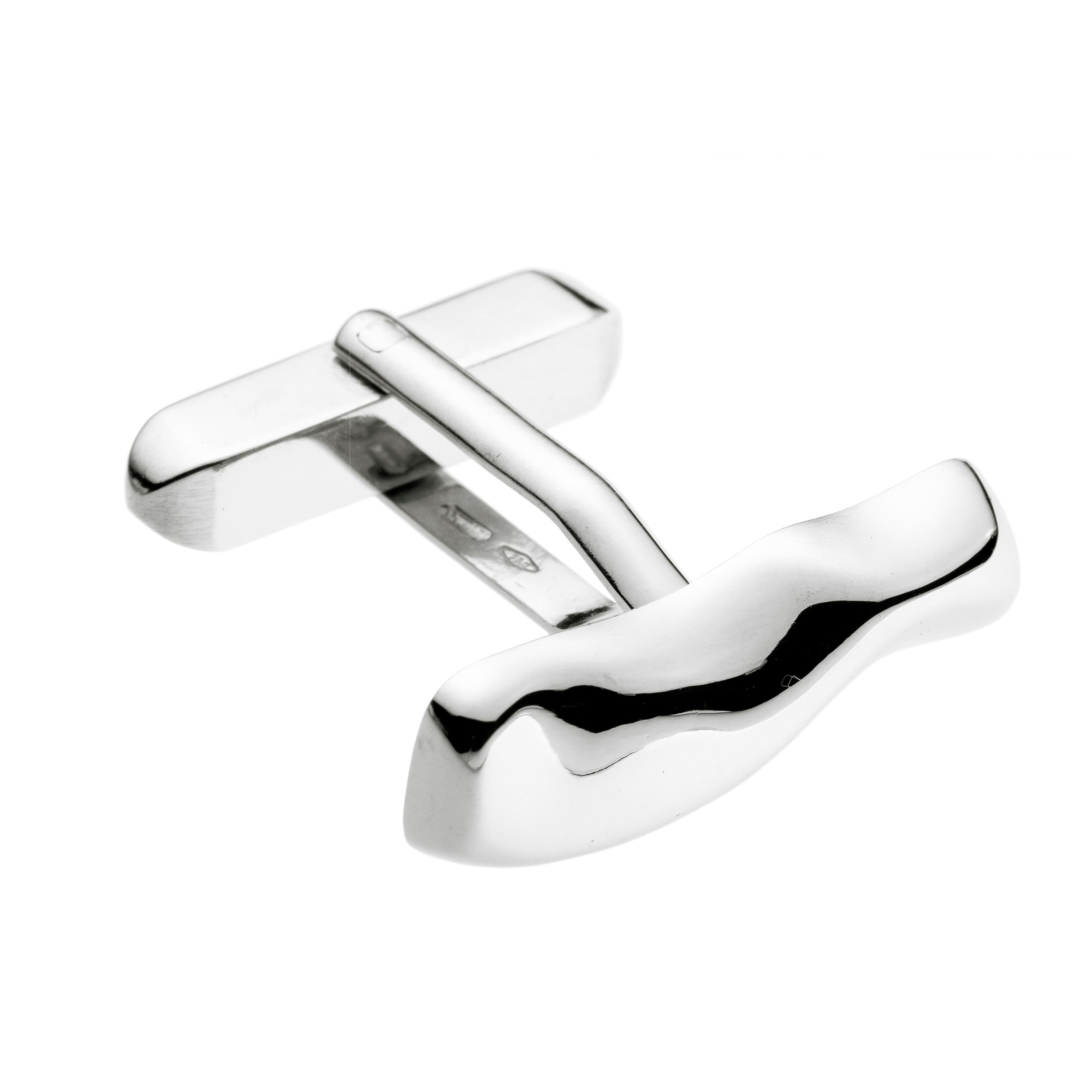 Mercure contemporary Cufflinks in white gold are made by hand in Nathalie Jean's Milan atelier in limited edition. Small, delicate, ebbing sculptures with seemingly random forms, these supple shapes are modulated in relief and seem to flow like