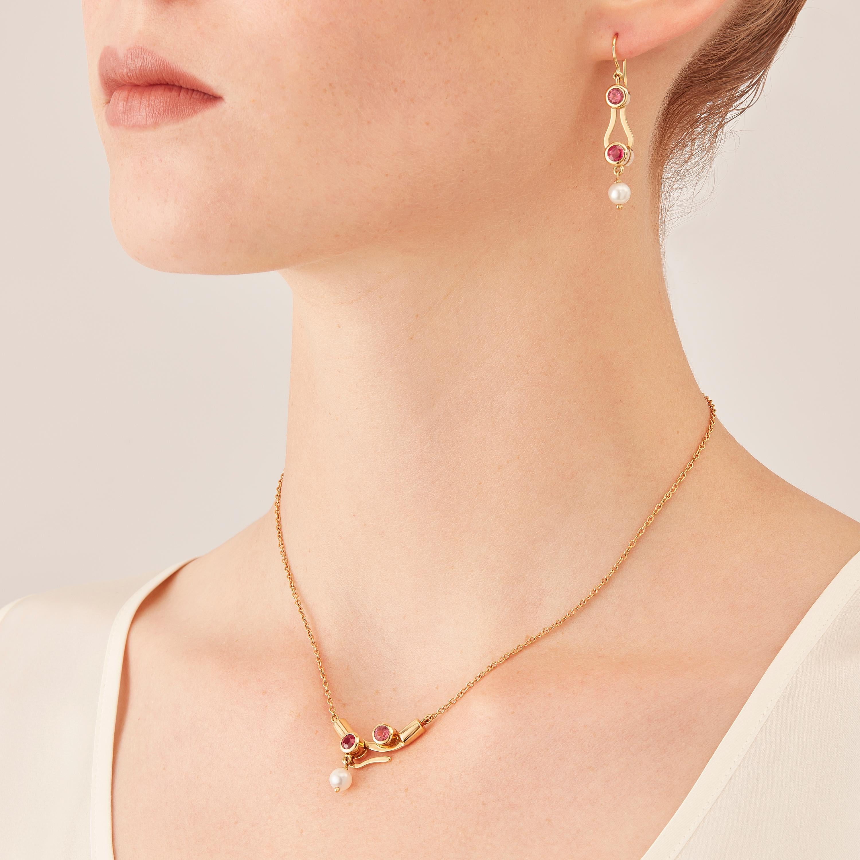 Micro Pendant drop necklace is in 18 karat in rosé gold, a warm, sophisticated color close to yellow gold. It is part of the Microcosmos Series, devised as a game, a construction or a sophisticated aerial mobile. Shapes attached to gold settings