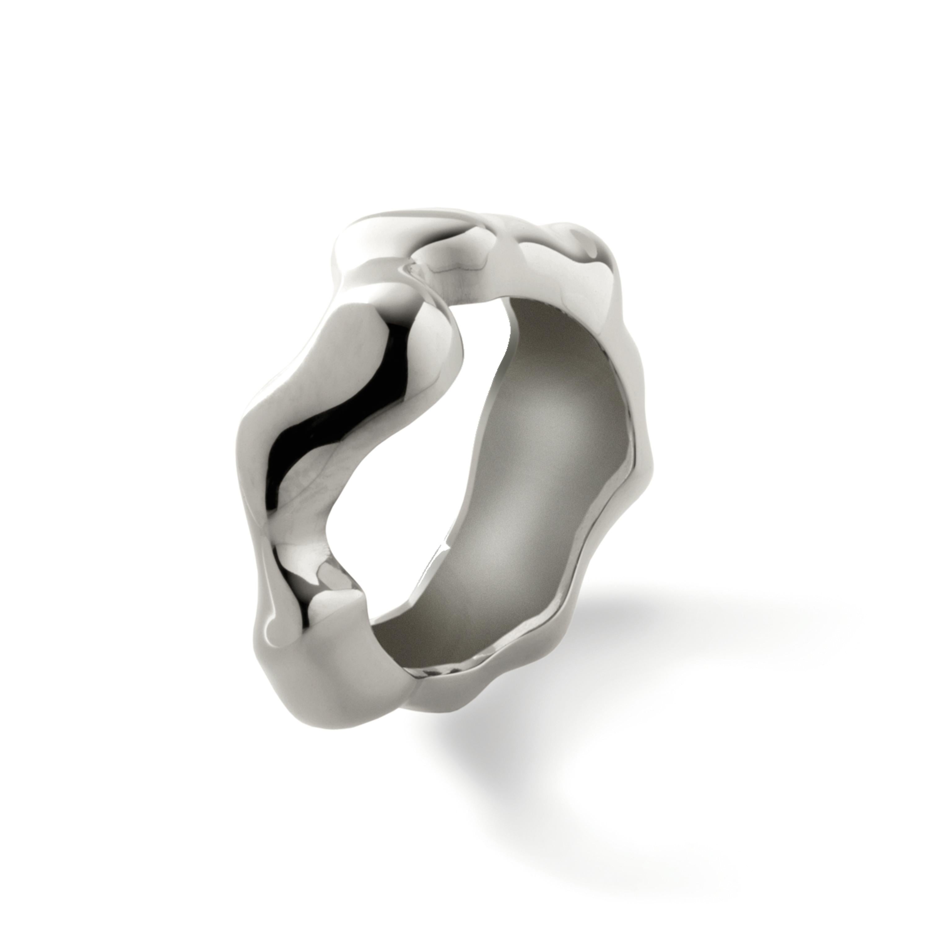 Made by hand in Nathalie Jean's Milan atelier in limited edition, Mercure Fashion Ring is in rhodium plated sterling silver. Small, delicate, ebbing sculpture with seemingly random forms, these supple shapes are modulated in relief and seem to flow