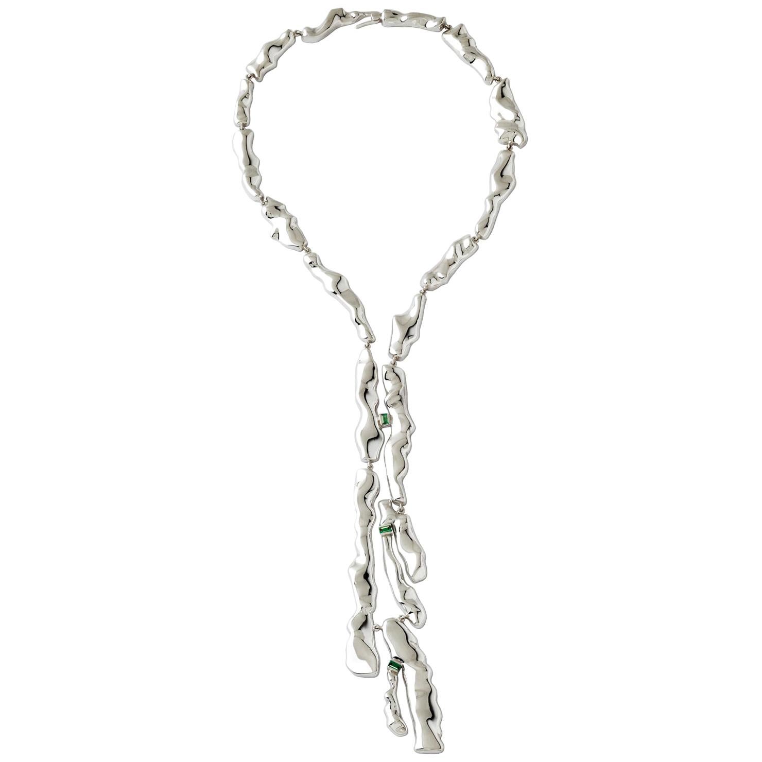 Made by hand in Nathalie Jean's Milan atelier in limited edition, the Mercure Tie drop necklace is composed of 19 elements of varying dimensions in rhodium plated sterling silver. Clever hidden links allow the pieces to drape nicely around the neck