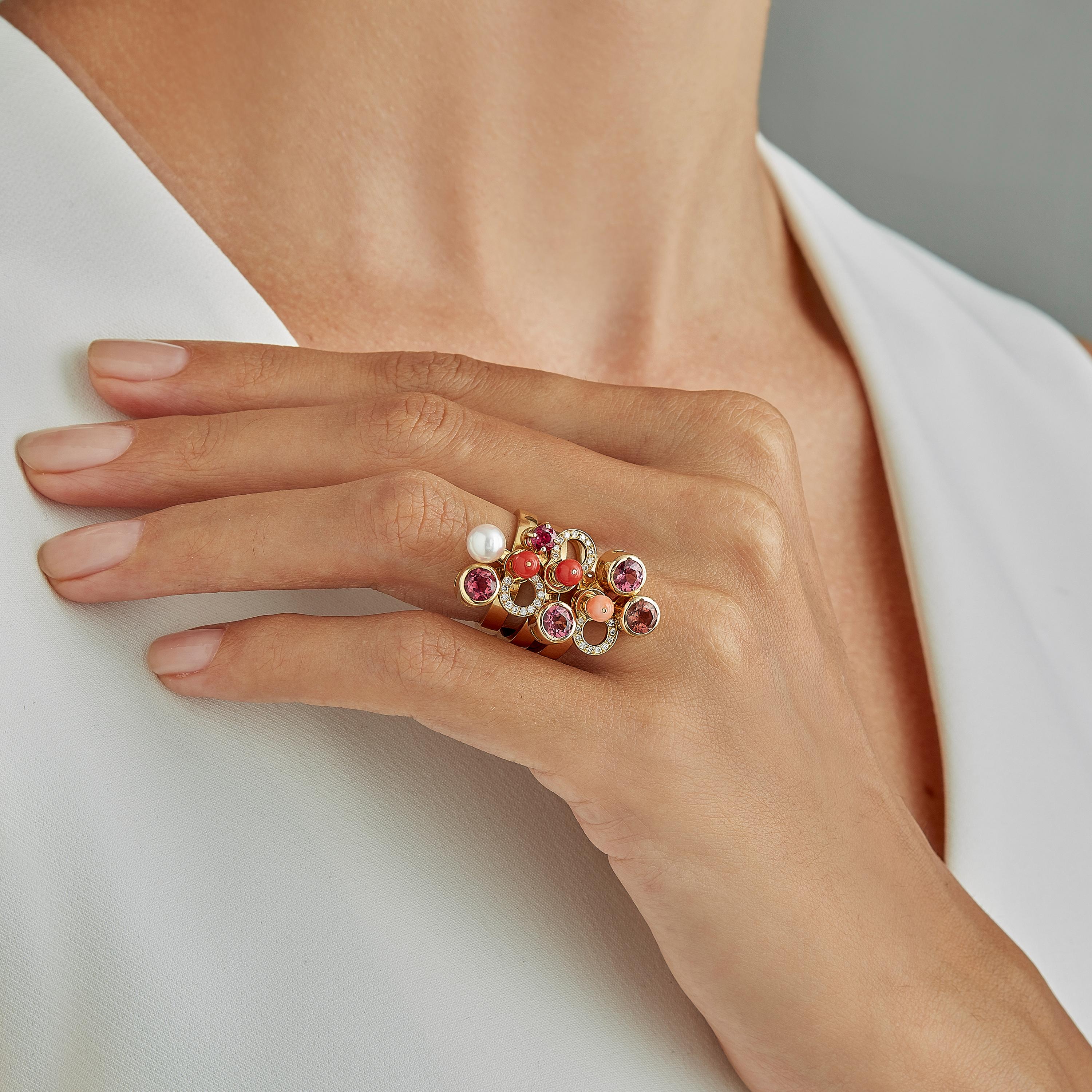 Made by hand in Nathalie Jean's Milan atelier, Cosmos Three Stack Rings from the Microcosmos Series are devised as a game, a construction or a sophisticated aerial mobile. Shapes attached to gold rings dangle lightly on the hand, their sculptural