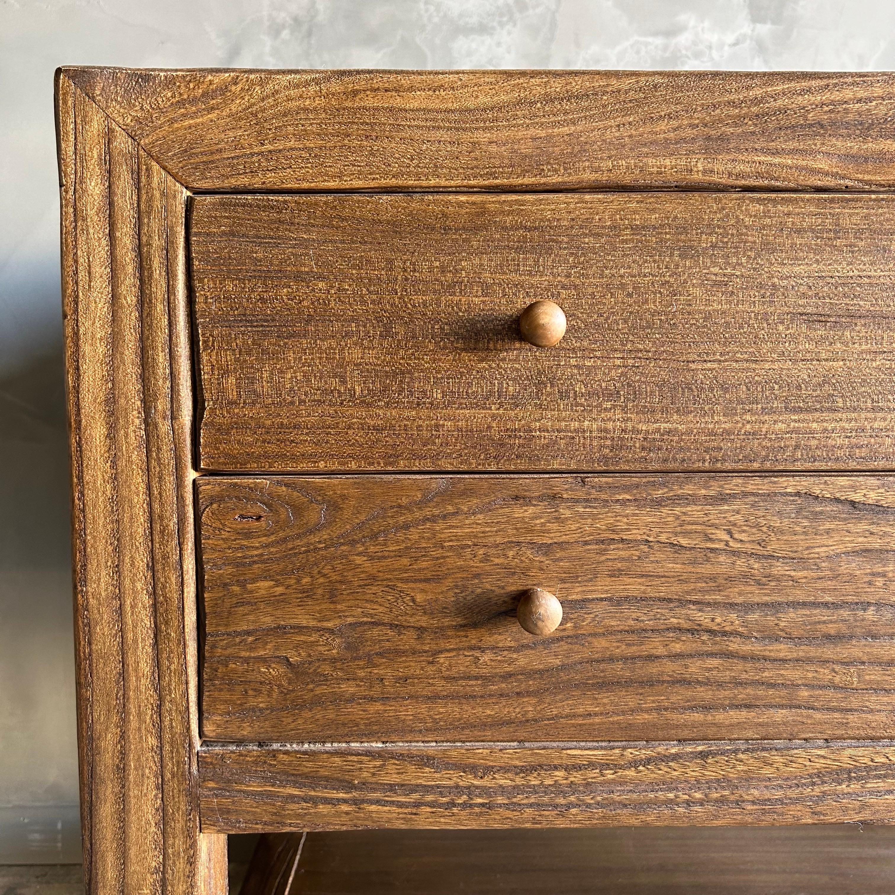 The Natalie Nightstand is a charming bedside storage solution. 
The two-drawers offers both convenience and function. Due to the reclaimed wood material, some variations and imperfections are considered normal and add to the unique character of each