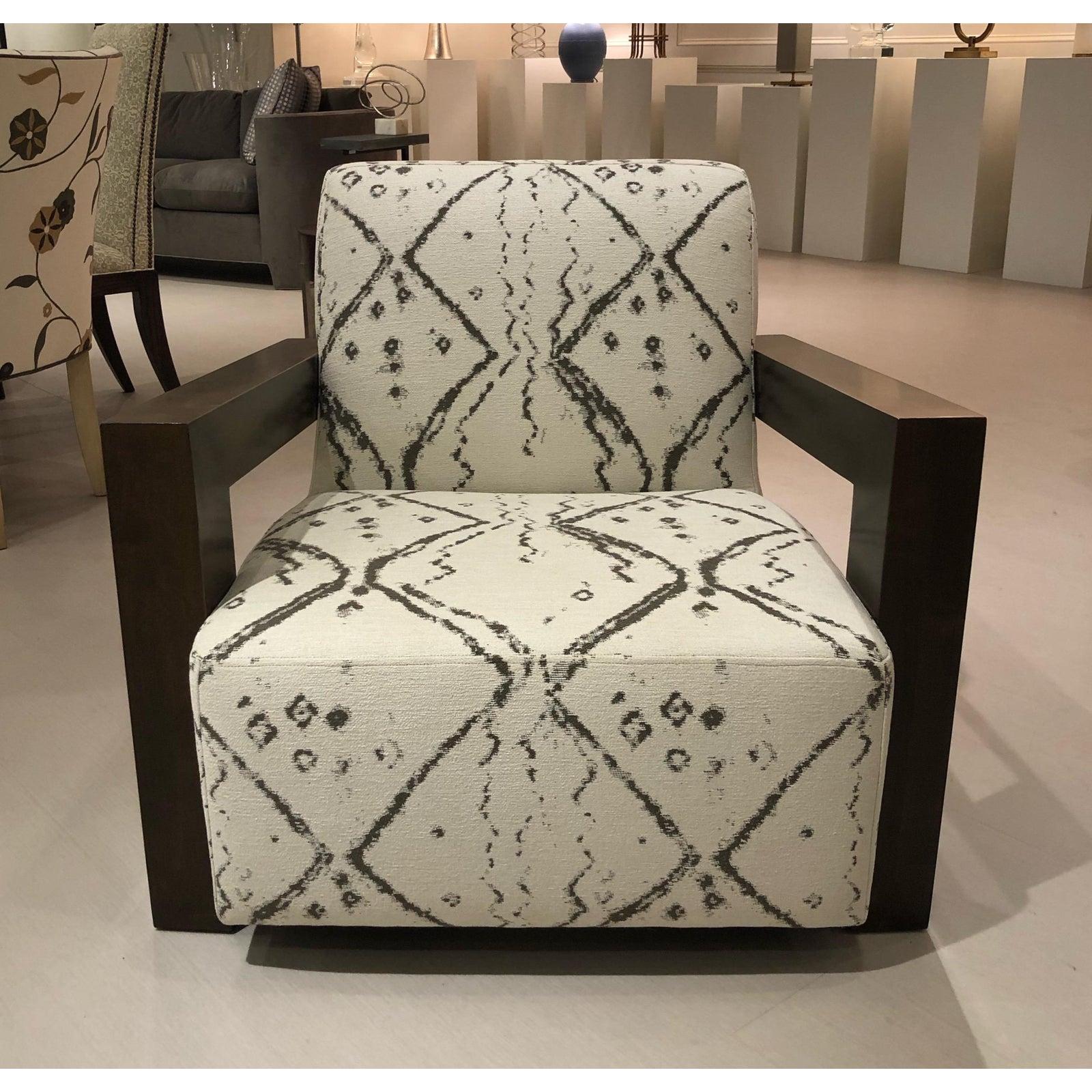 Showroom New. Nathan Anthony is known for their award winning furniture designs. The Kinetic chair has a modern flair but easily works in a more transitional or even rustic setting. The chair sports a dramatic wood frame and a comfortable sit. This
