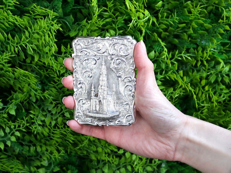 An exceptional, fine and impressive antique Victorian English sterling silver card case made by Nathaniel Mills; an addition to our range of collectable silverware

This exceptional antique Victorian sterling silver card case has a rectangular