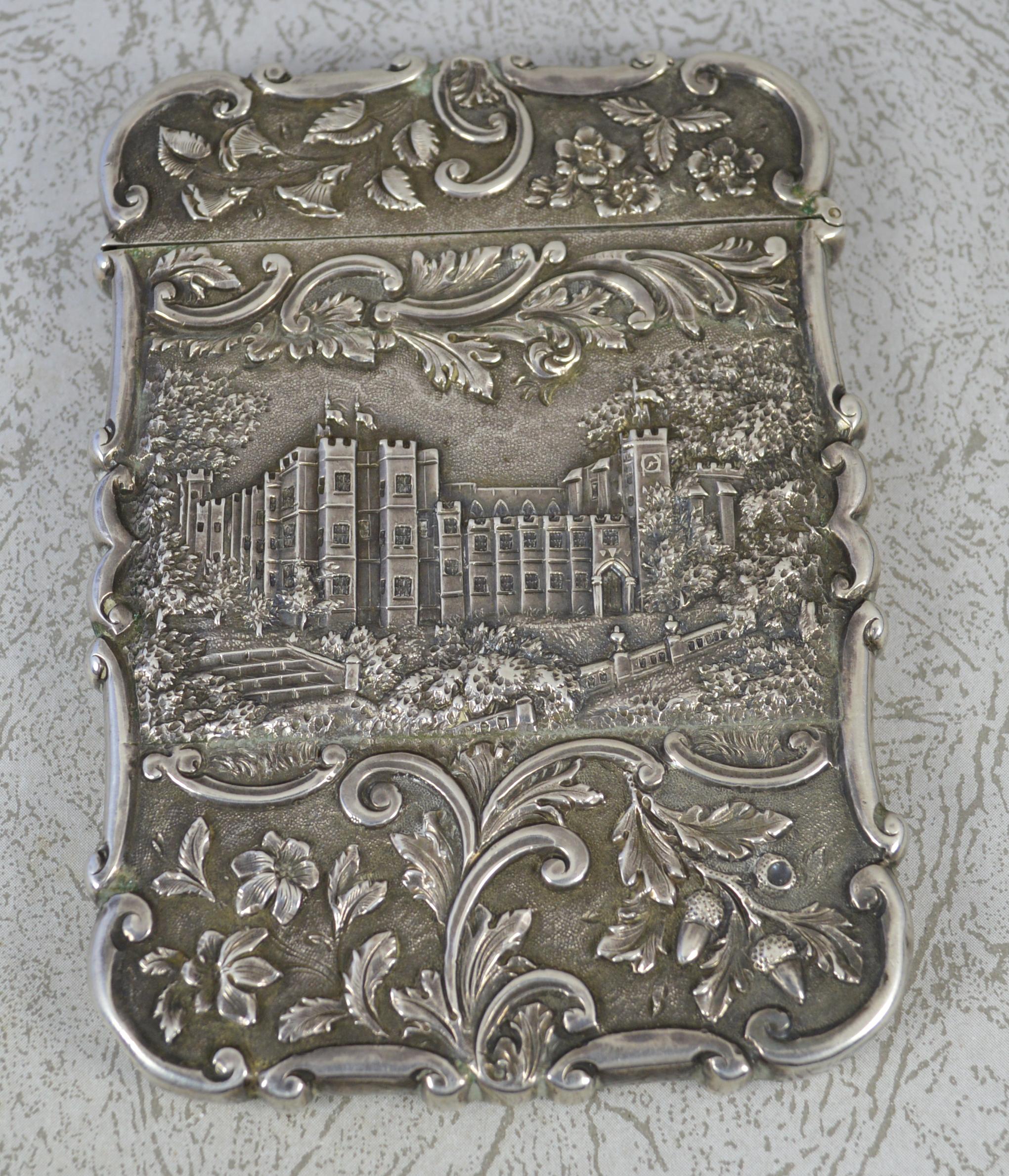 A stunning quality sterling silver card case.
Early Victorian period example by Nathaniel Mills.
The castle top design is of Warwick castle to one side and Windsor the other.
Hallmarks ; lion, Birmingham anchor, Queen Victoria's head and makers