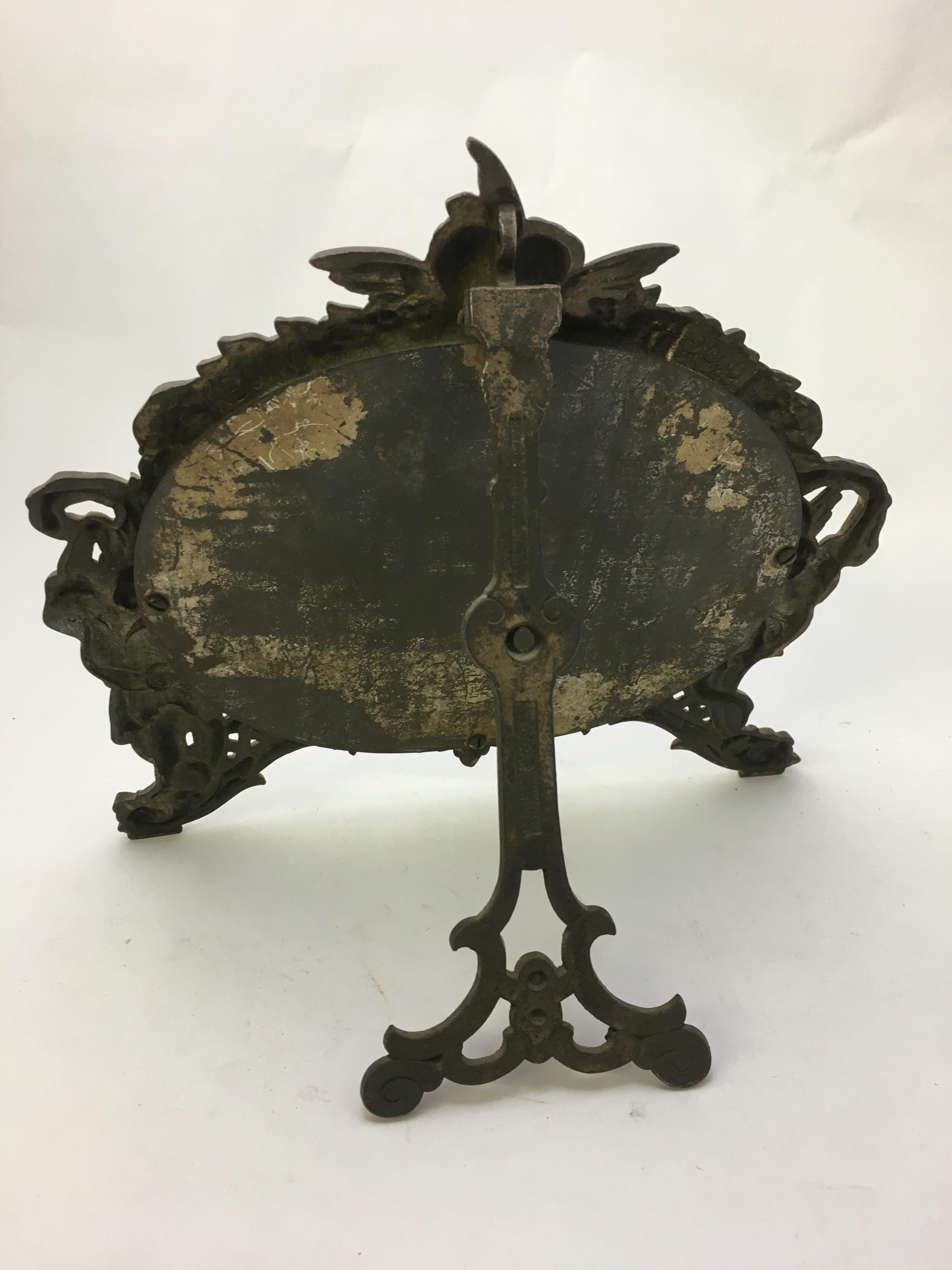 American National Bronze and Iron Works Gilded Iron Mirror with Putti
