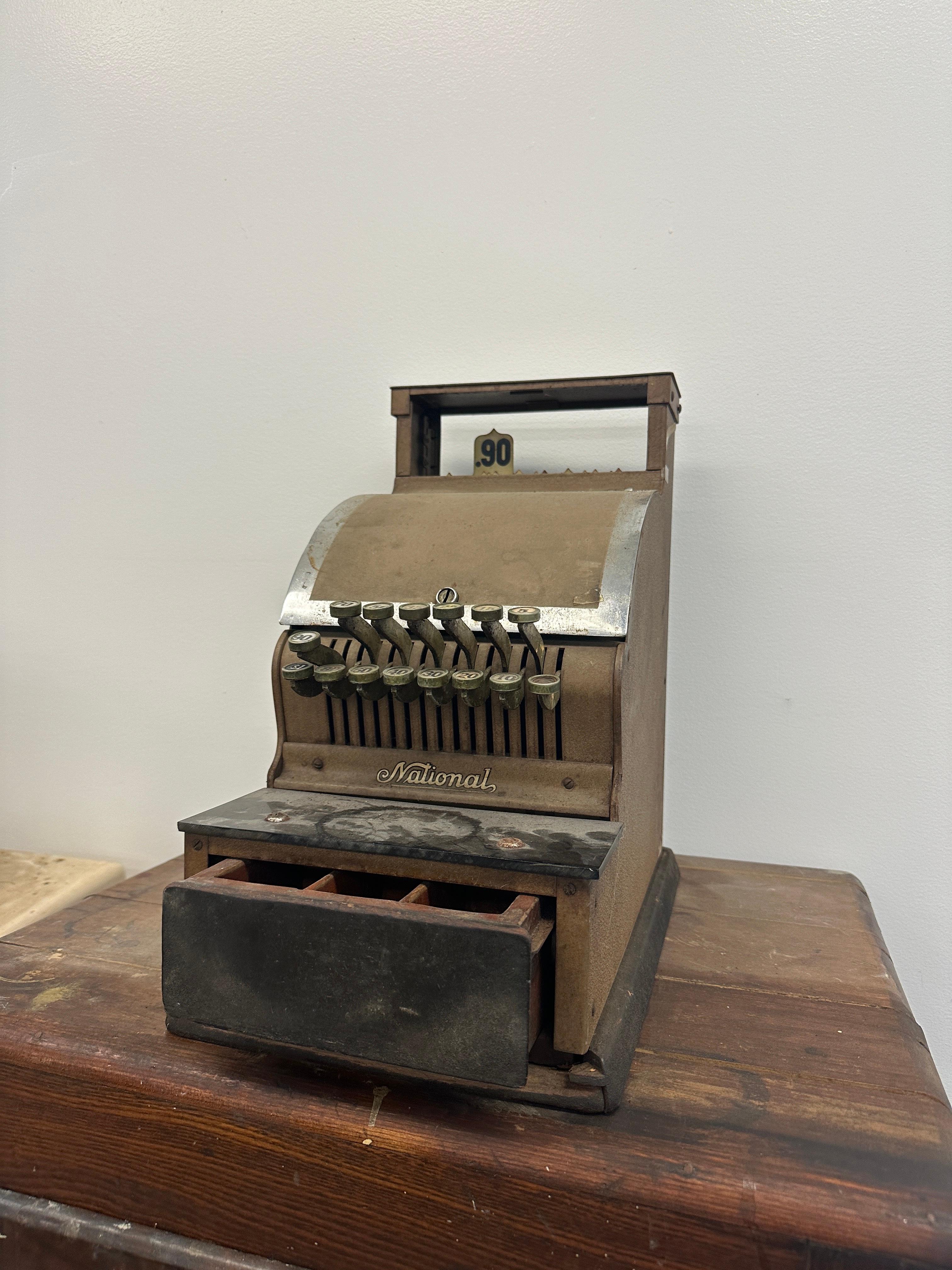 Vintage condition national cash register from the early 20th century.