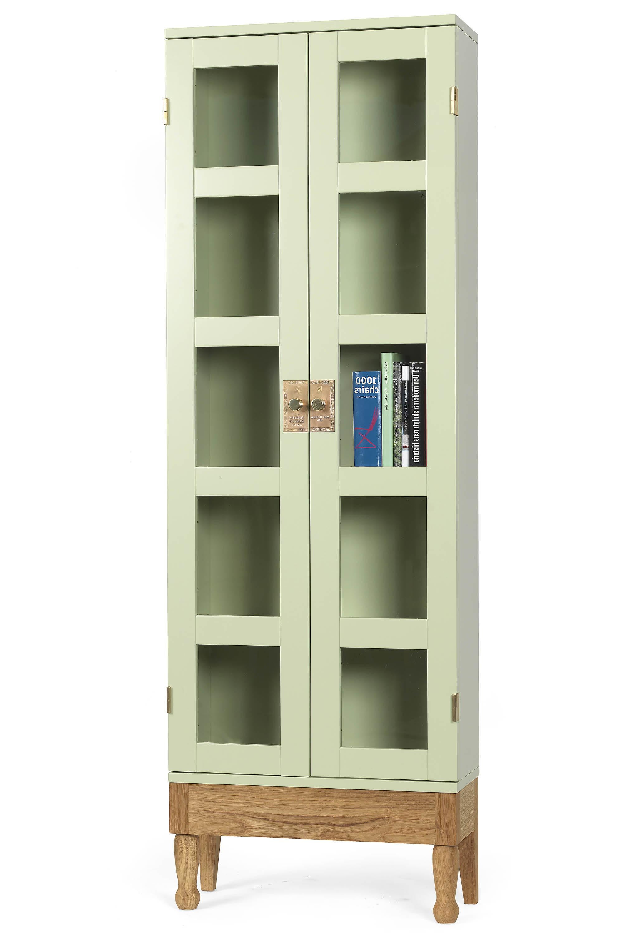 Glass doors, stained in yellow, brass details. Base of solid natural beech. Suitable for storing The National Geographic Magazine. Each section stores 25 years of magazine.
Yellow, base in solid natural beech or green, base in solid oiled oak.