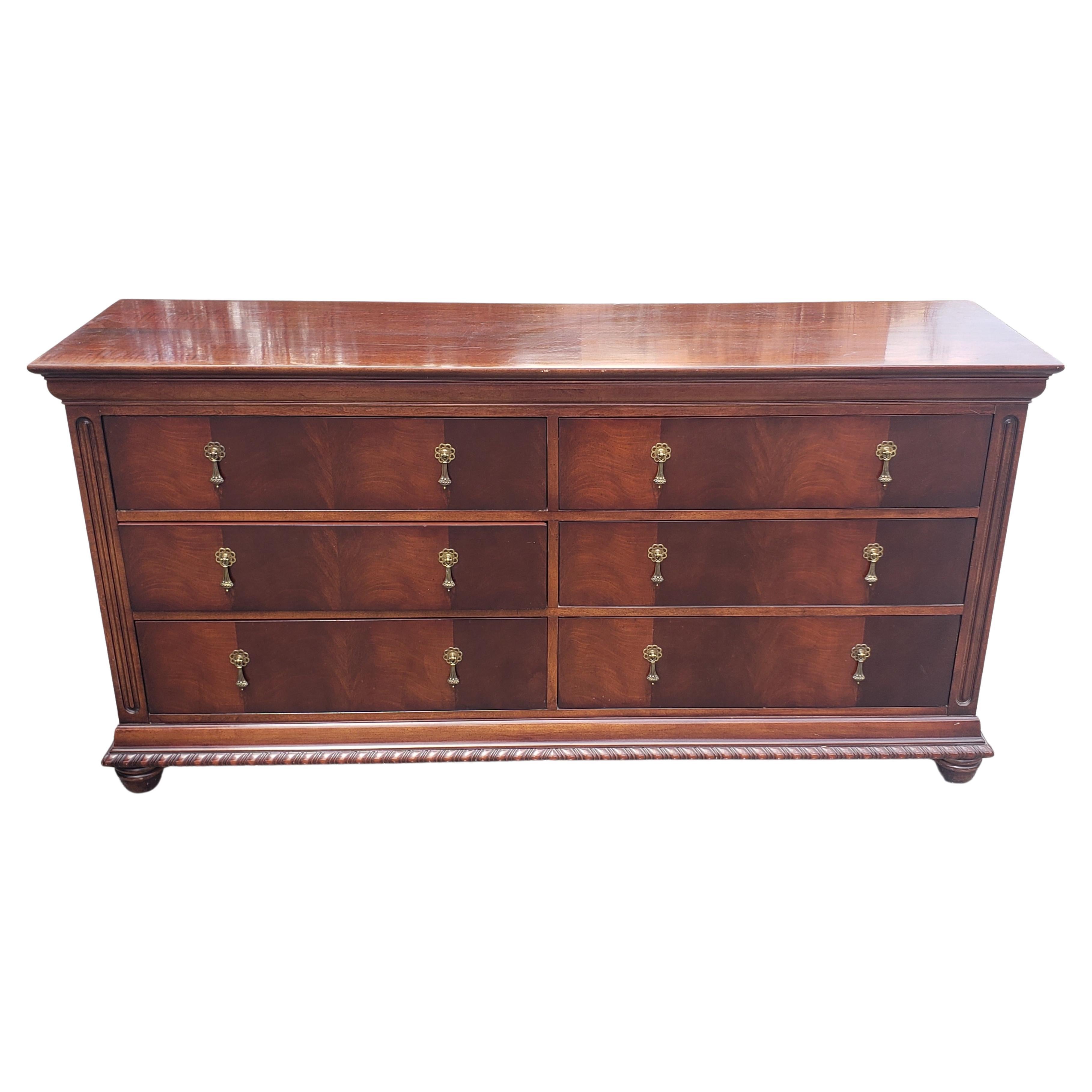 A well kept National Mt-Airy Flame Mahogany Double Dresser in solid and flame mahogany. Features 6 dovetailed drawers operating perfectly. Measures 68