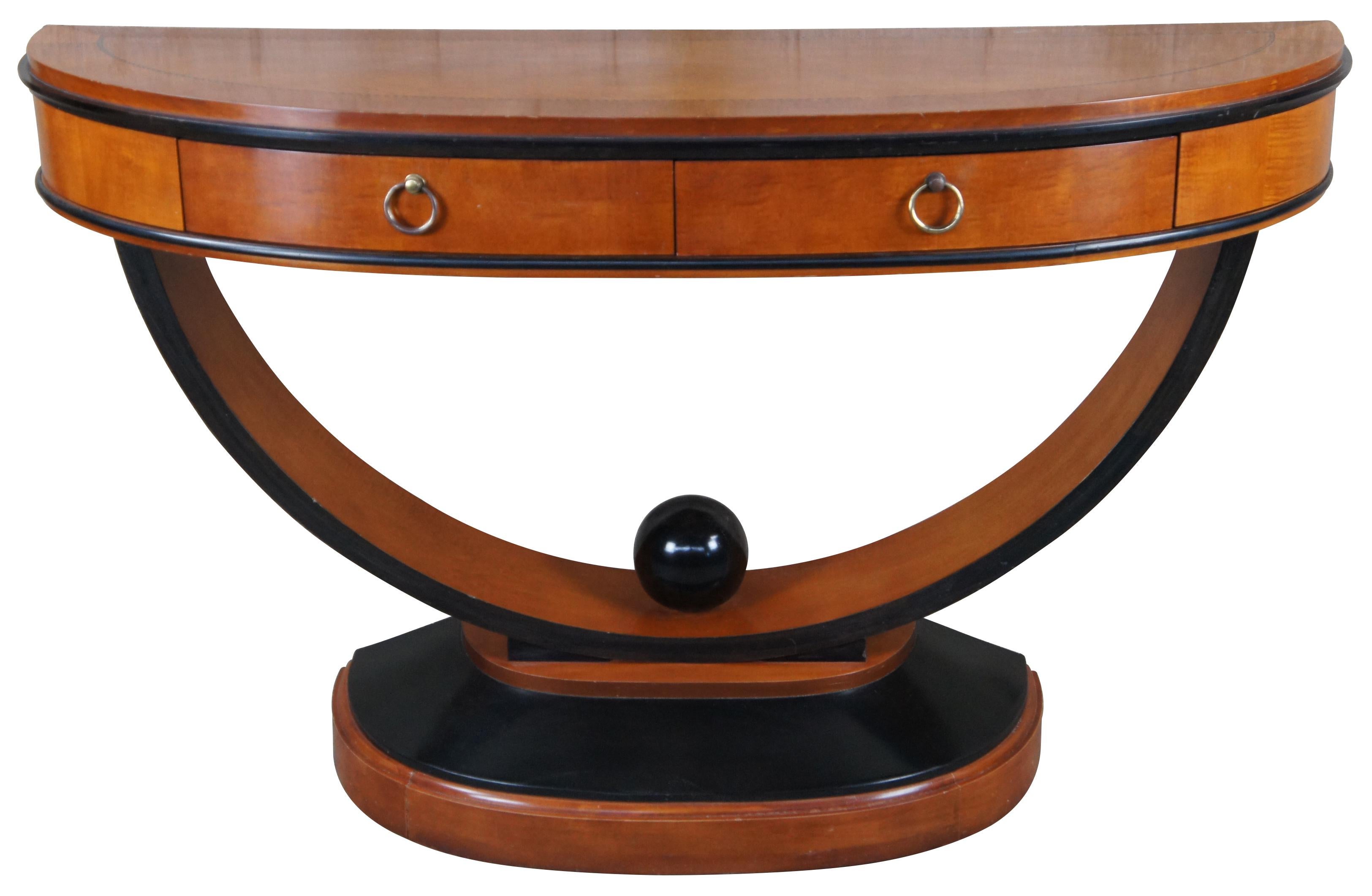 1990s National Mt. Airy Biedermeier Console server and mirror. A demilune or crescent shape made from maple with ebolized accents and inlay along top. Features two felt lined serving drawers and outer hidden cabinets that pop open via magnetic