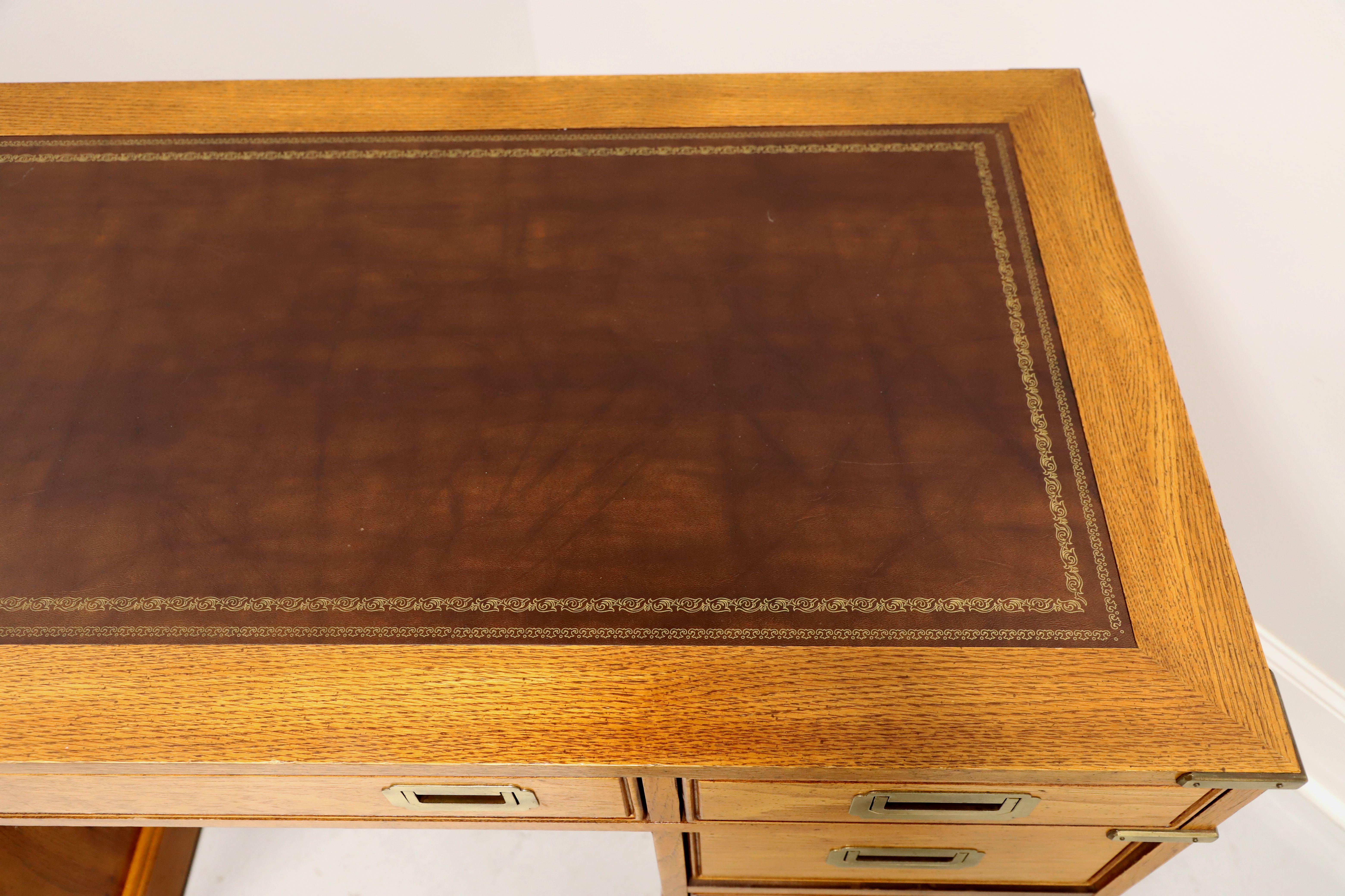 NATIONAL MT. AIRY Oak Campaign Style Kneehole Desk with Leather Writing Surface In Good Condition In Charlotte, NC