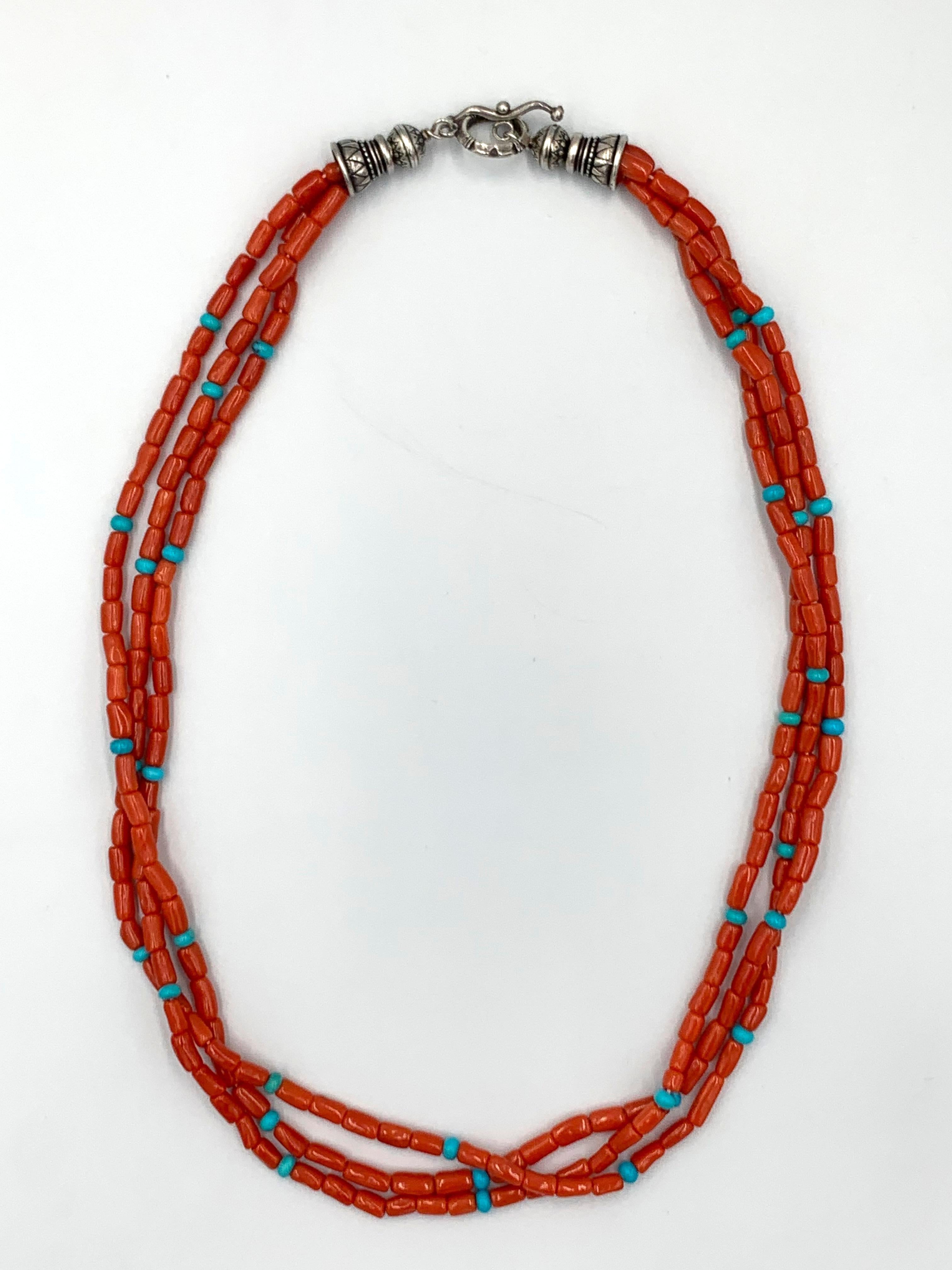Native American 3-Strand Mediterranean Coral Beaded Necklace

Three strands of hand rolled tubed Mediterranean red coral beads interspaced with small blue Sleeping Beauty turquoise beads. The 20” necklace has sterling silver ends with a toggle