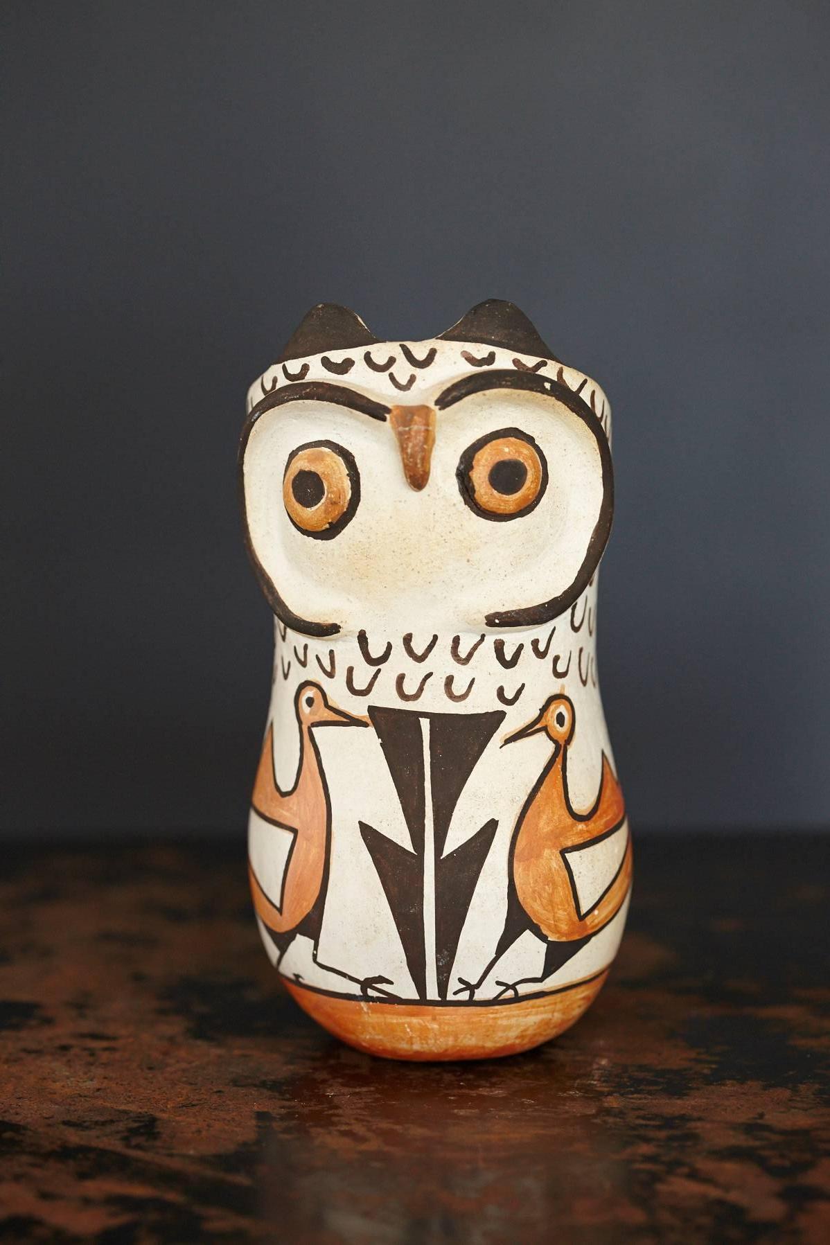 Outstanding Acoma polychromed earthenware owl jar by Frances Torivio, New Mexico, circa 1960s.
The piece is signed on the bottom Frances Torivio, Acoma N.M.
The piece is in good condition and has a small repair on the nose of the owl., otherwise