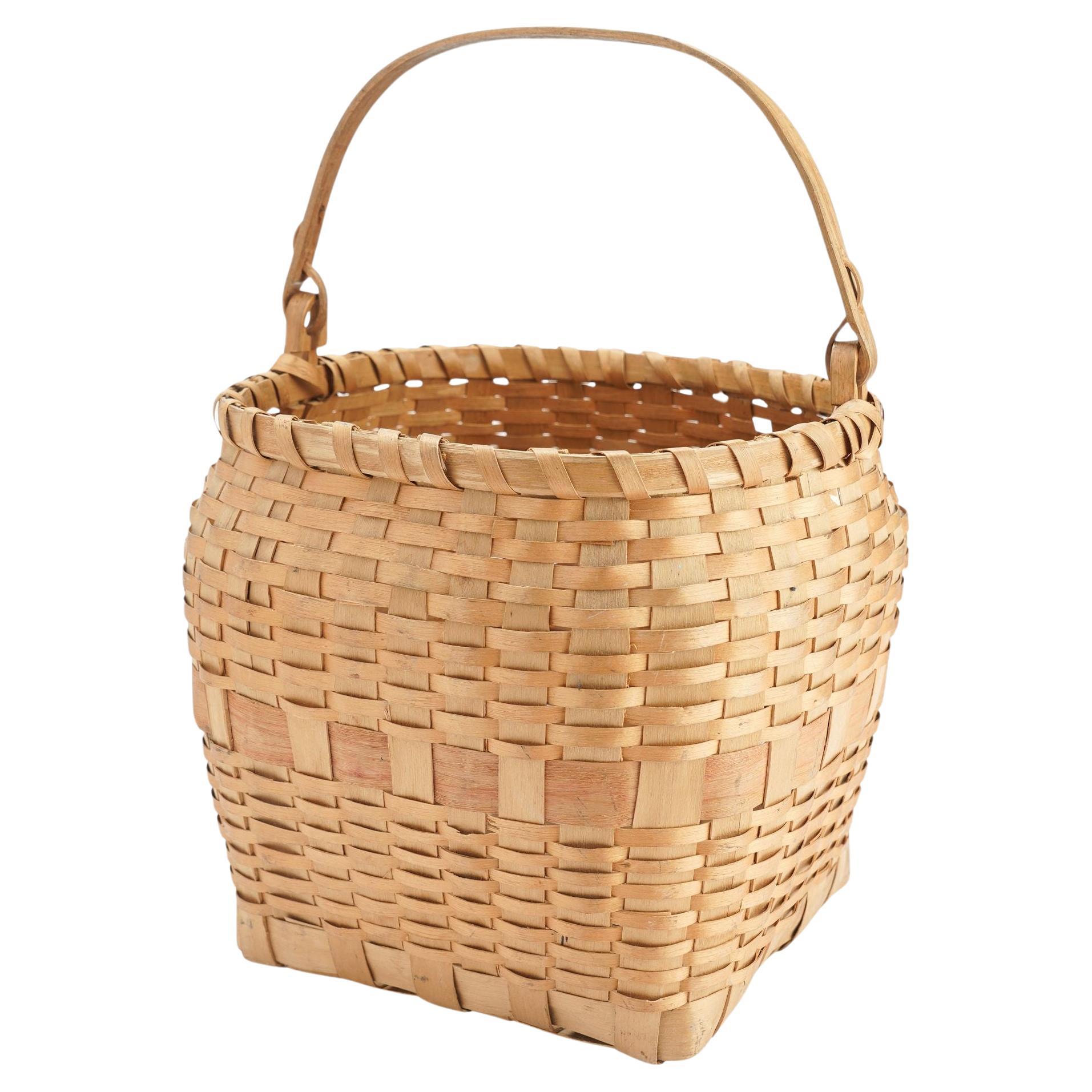 Native American ash basket with carved handle, 1880-1910 For Sale
