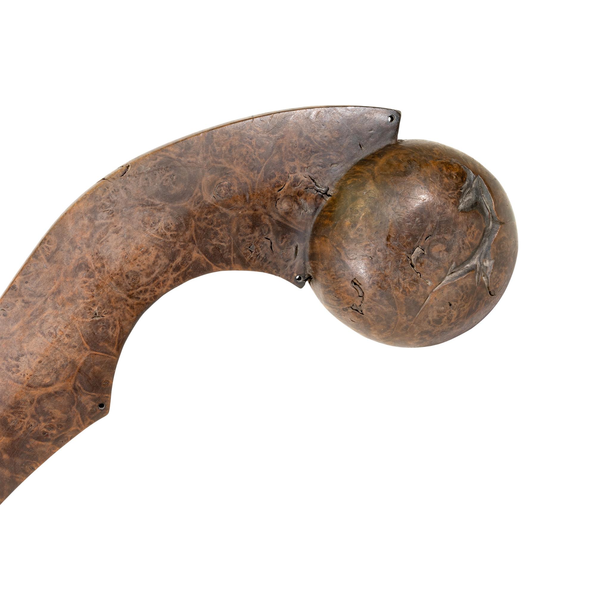 Native American 19th century ball headed club from the Great Lakes region. Carved from walnut burl. Smooth surface with beautiful wood grain. Exceptional patina. From a Wisconsin Collection. The perfect addition to any handmade indigenous weapon