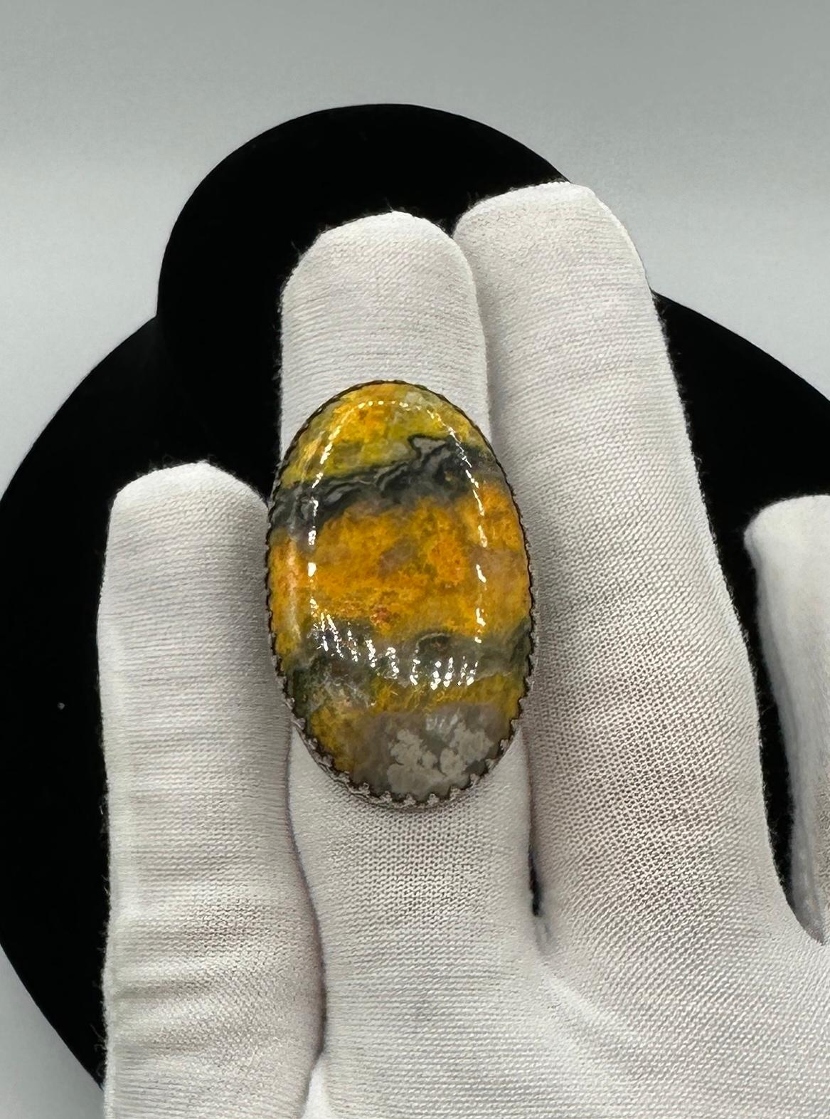 This is a stunning and very rare Native American Bumble Bee Agate Sterling Silver Ring by the San Filipe artist Jacob Jake Francosa and signed with his Jacob Francosa signature.  The large dramatic Native American ring has a magnificent Bumble Bee