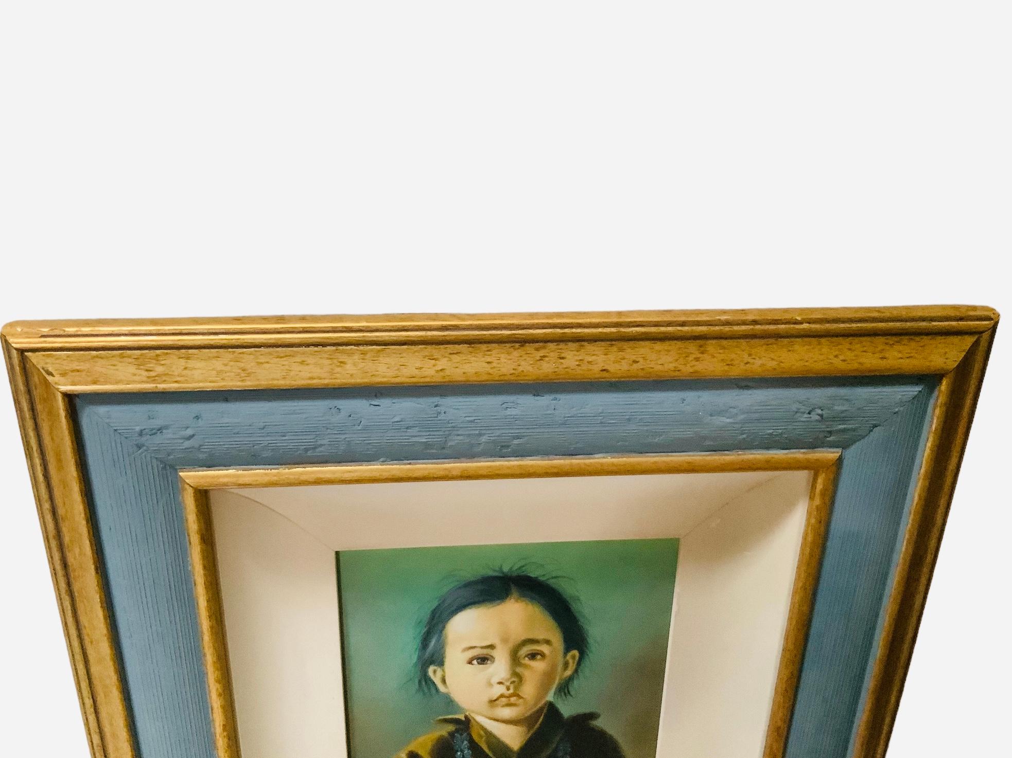 This is a Native American Boy Painting. It depicts a hand painted portrait of a Navajo child. He has black hair and very expressive brown eyes. He is wearing a dark brown shirt with a turquoise necklace. The painting is signed S or G. Miller in the