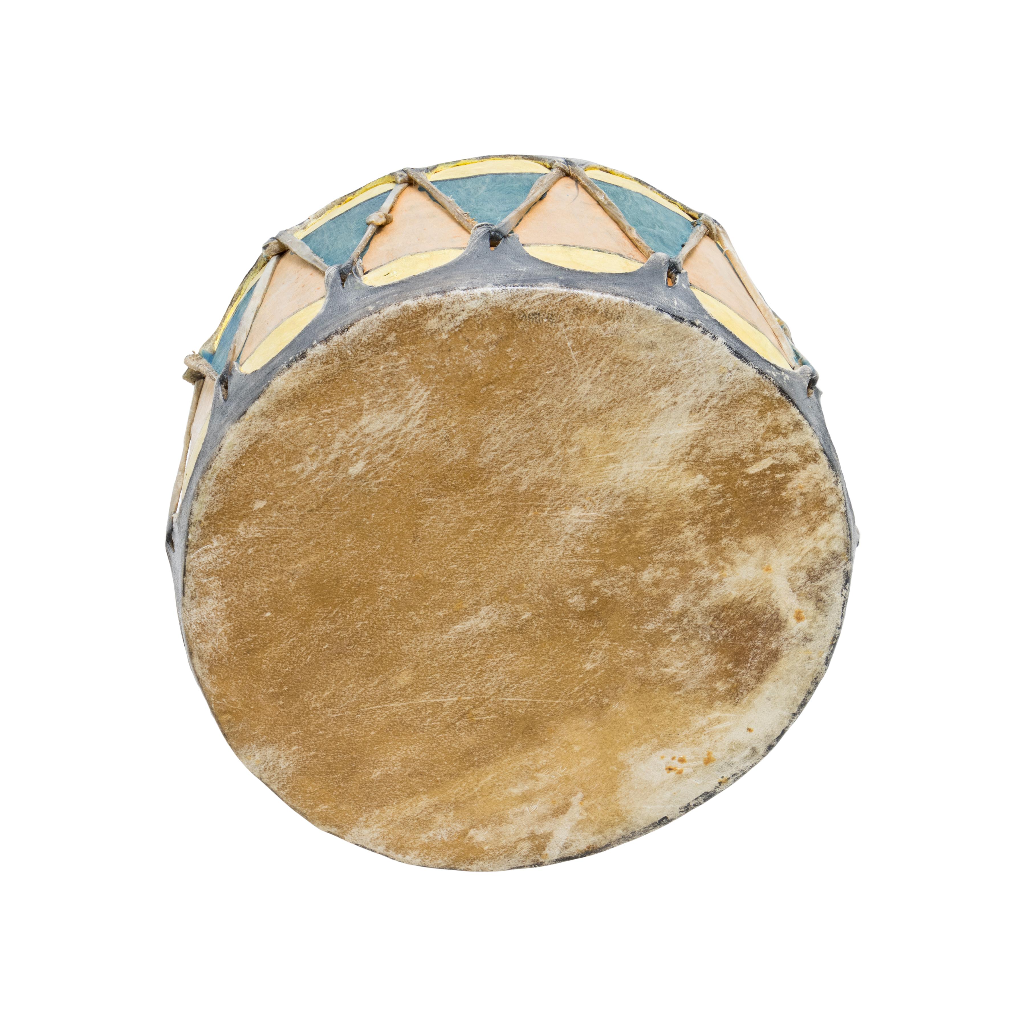 Native American Cochiti drum with sides painted in tan, yellow and blue with black striping. Made of wood and hide. 

Period: Early 20th century

Origin: Southwest, Cochiti

Size: 7 1/2