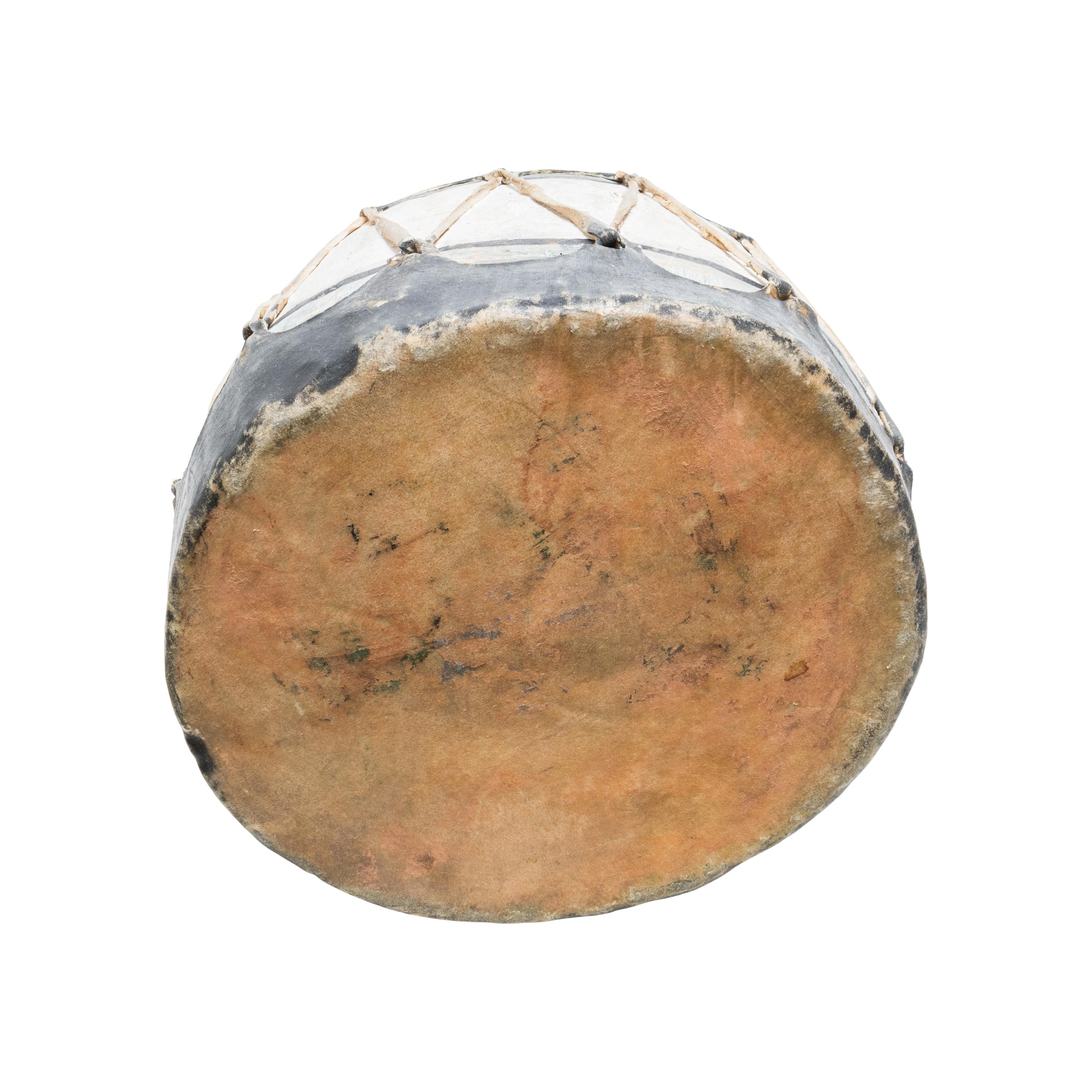 Native American Cochiti drum with sides painted in black, white and turquoise. Made of a cottonwood log and hide. 

Period: Early 20th century

Origin: Southwest, Cochiti

Size: 11