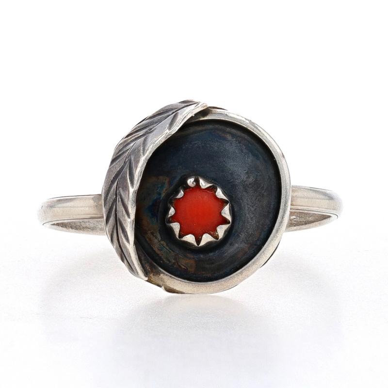 Size: 7
Sizing Fee: Up 2 sizes for $30 or Down 3 sizes for $30

Native American

Metal Content: Sterling Silver

Stone Information
Natural Coral
Color: Orangey Red

Style: Solitaire

Measurements
Face Height (north to south): 15/32