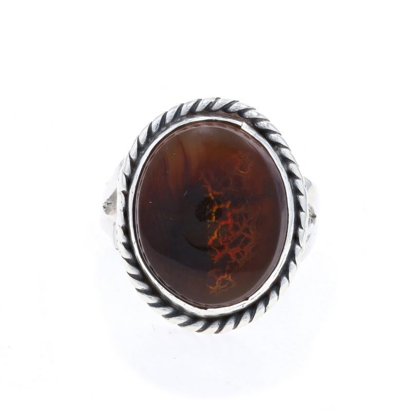 Size: 7
Sizing Fee: Up 3 sizes for $20 or Down 1 size for $20

Native American

Metal Content: Sterling Silver

Stone Information

Natural Fire Agate
Cut: Oval Cabochon

Style: Cocktail Solitaire
Features: Rope-Textured Border & Split
