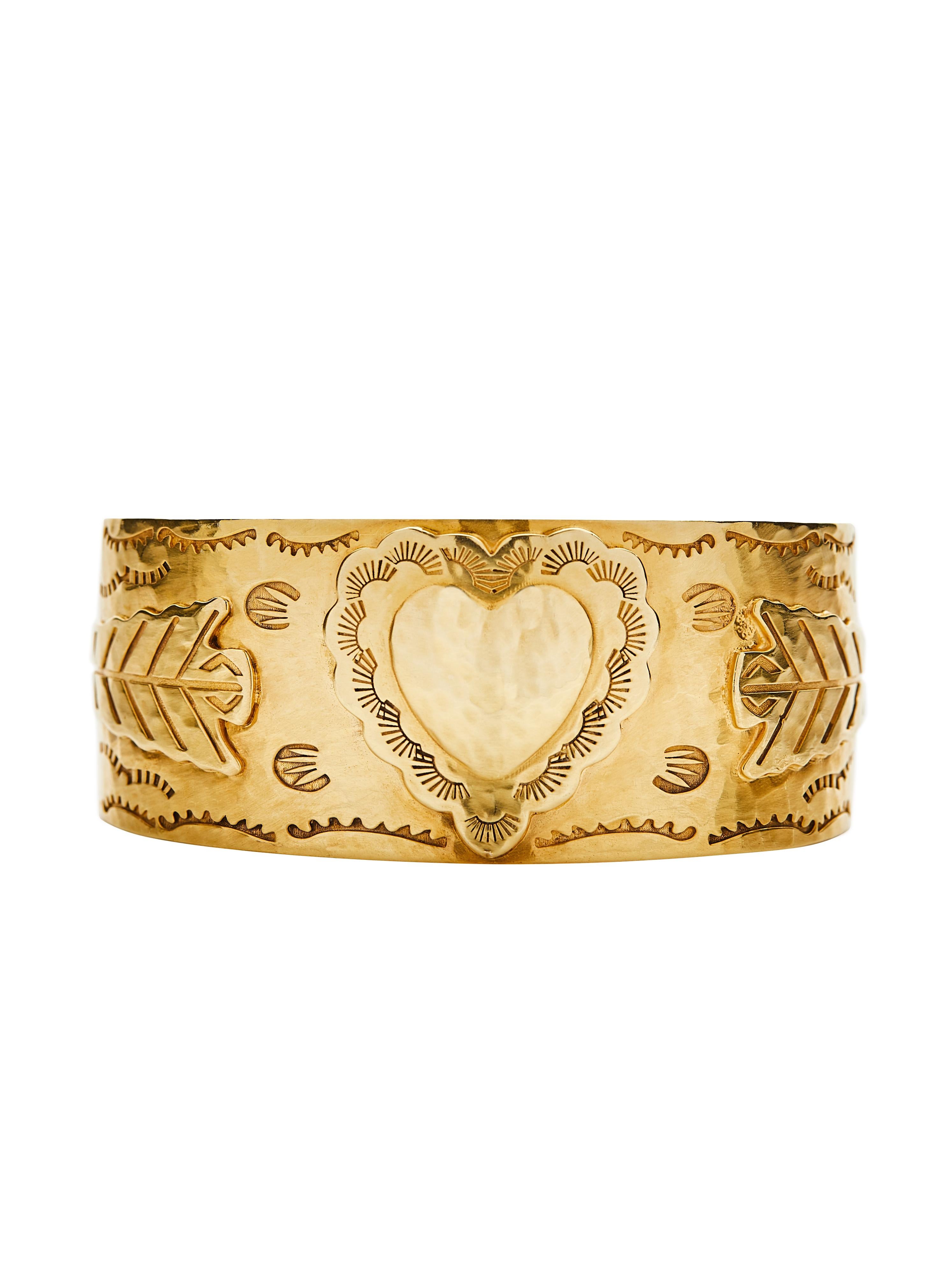 The heart cuff bracelet is designed by Christina Alexiou.
The heart cuff bracelet is crafted with 18k yellow gold handmade in Greece. As Christina Alexiou notes, she draws on jewellery's ancient purpose as 