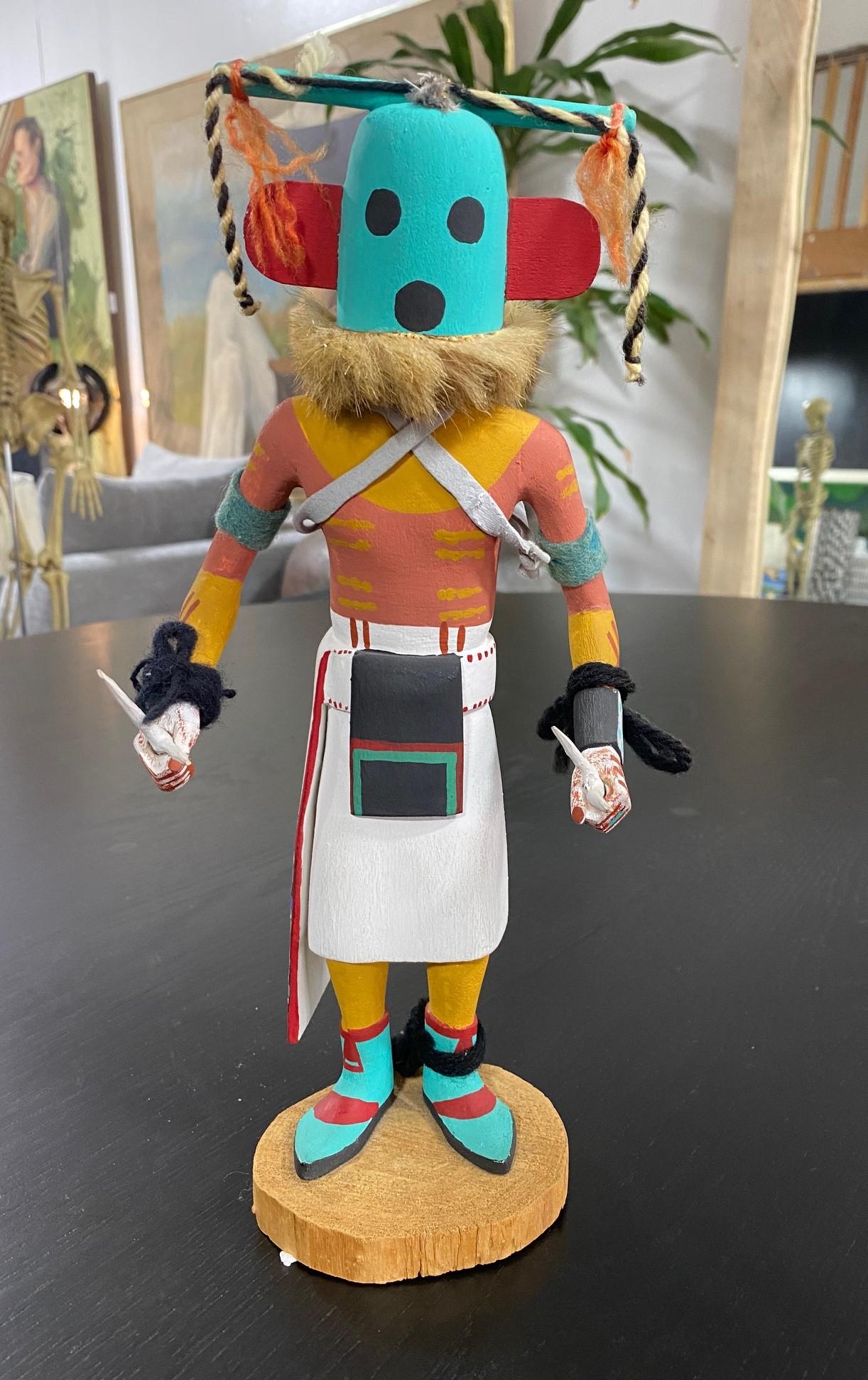 A wonderfully hand-painted/detailed and decorated Native American Hopi Kachina doll. Nice Size. A striking piece overall. 

From a collection of Native American objects and artifacts.

Would be a great addition to any Native American Kachina or