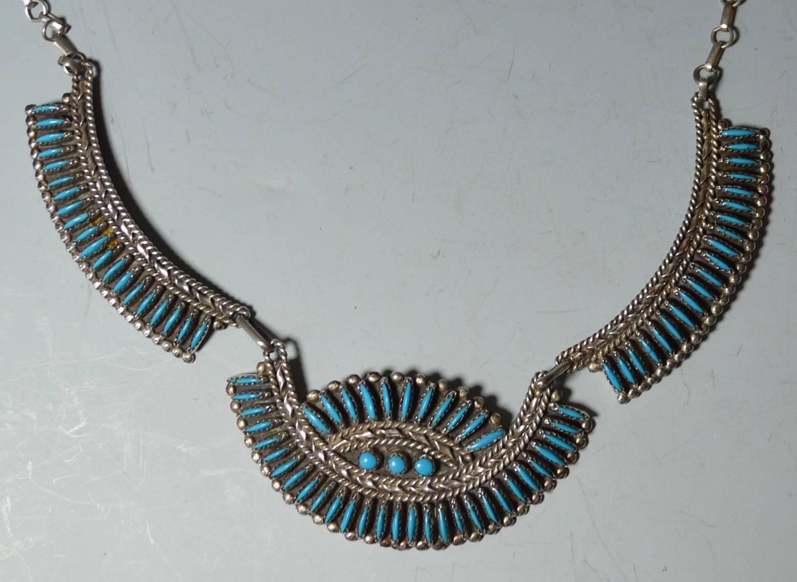 Native American Indian fine Zuni petite point
A beautiful vintage silver necklace with fine turquoise detail.
Period: 1960, Nola. Morgan
Condition: Fine.




 