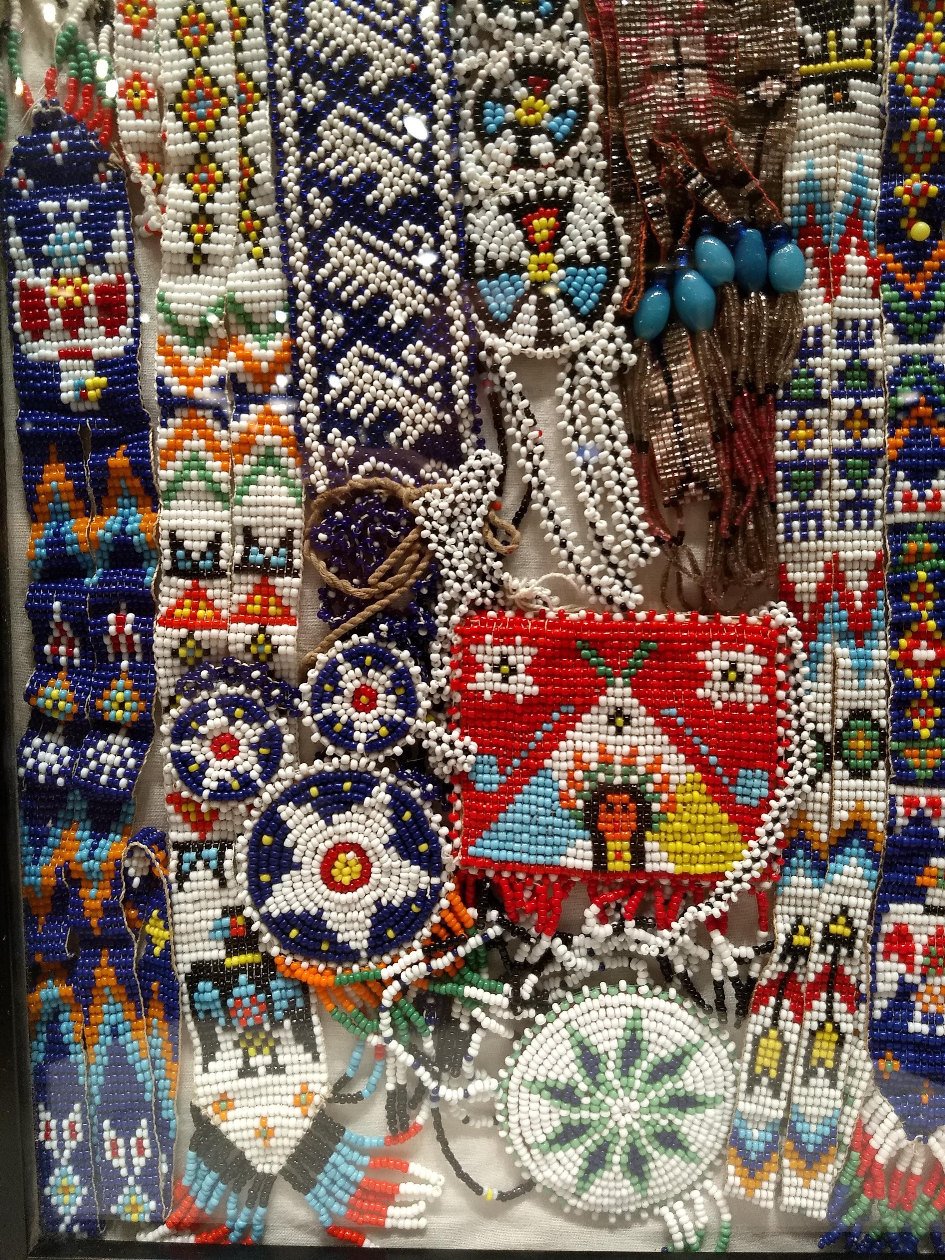 Native American Navajo Necklaces and Bracelets Beadwork Wall Art Collection.   The native American bead necklace collection contains ten different pieces, each individually hand-crafted bead artwork mounted in a shadow box for display on the table