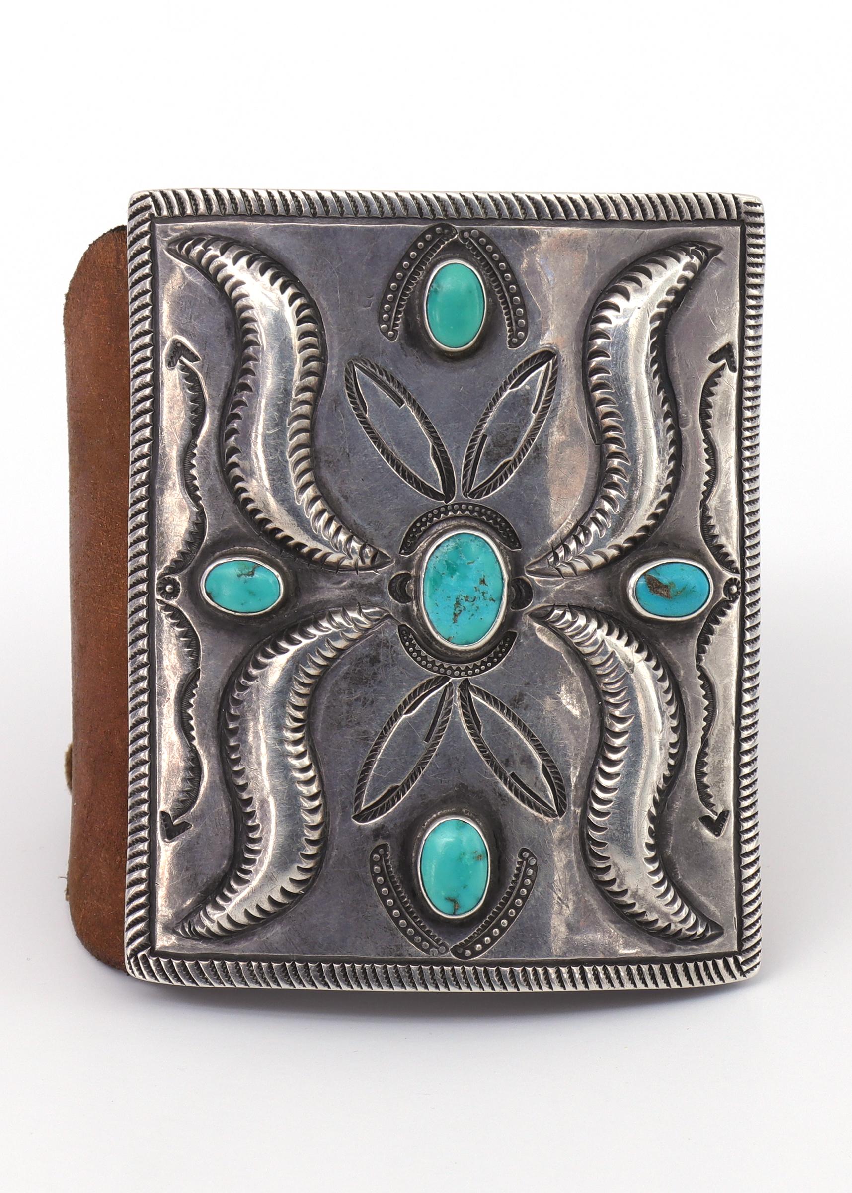 Vintage 1950s or 1960s Navajo Ketoh Stamped/engraved Silver Ketoh with Five Turquoise Cabochons and new leather band. Piece measures 3 x 3 x 2 inches.   The Ketoh was originally all leather and worn by Native American archers to protect their