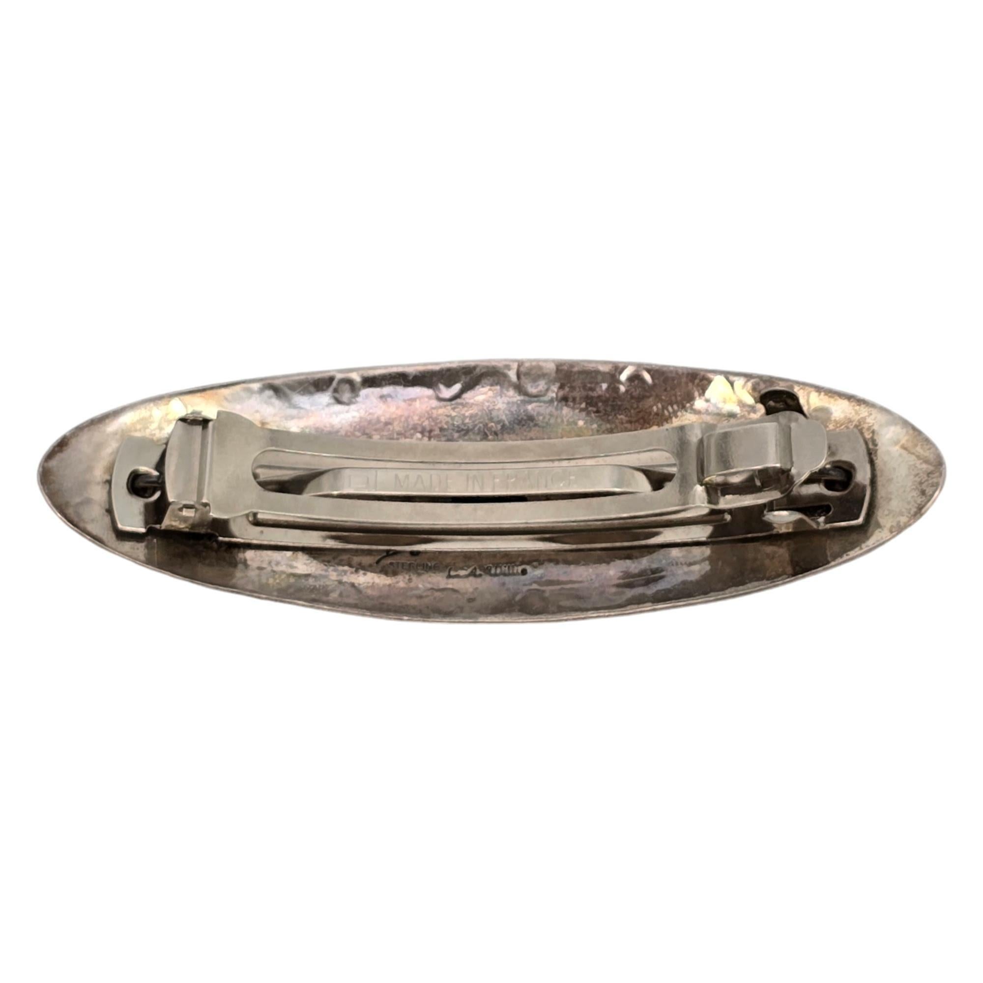 Sterling silver stamped barrette by Native American artisan LA Willie for Joe Delagrito shop.

This piece features traditional stamped designs.

Weighs approx 25.2g, 16.2dwt

Measures approx 4
