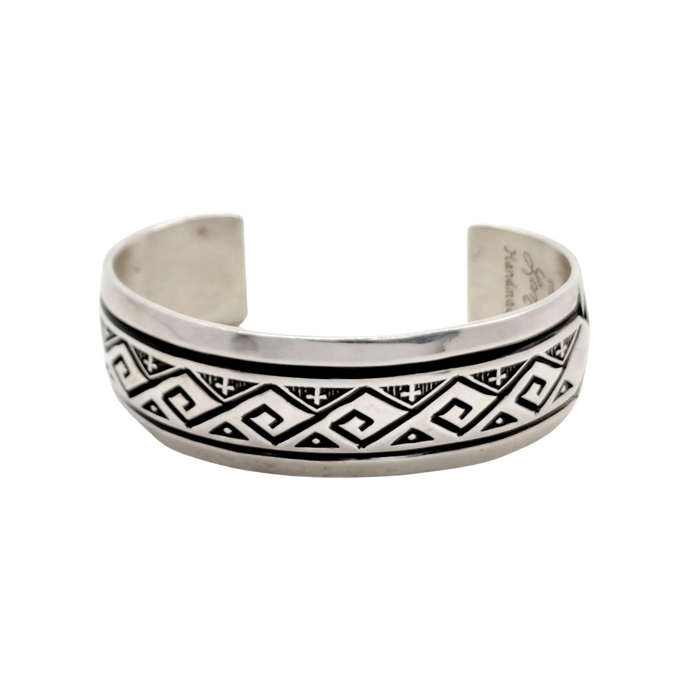 Sterling silver cuff bracelet by Native American artist Troy Lamer.

Navajo artisan, Troy Lamer, made this beautiful and ornate cuff bracelet by hand.

Measures approx 5 3/4