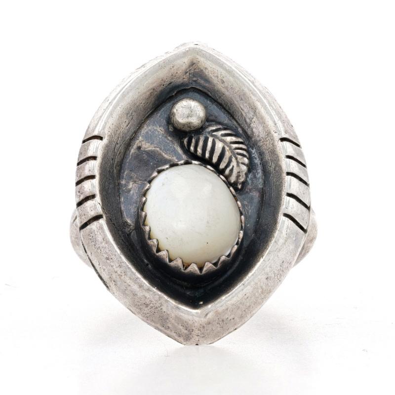Size: 5 3/4
Sizing Fee: Up 1 size for $30

Native American

Metal Content: 925 Sterling Silver

Stone Information

Natural Mother of Pearl
Cut: Oval Cabochon
Color: White

Style:  Solitaire
Theme: Feather 
Features:  Etched