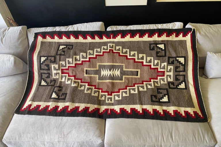 A wonderfully designed geometric patterned (of which the Navajo Tribe is famed for) blanket/rug with rich, bright colors. Good size. 
From a collection of Native American objects - pottery, blankets, rugs, etc...

Would be a great addition to any