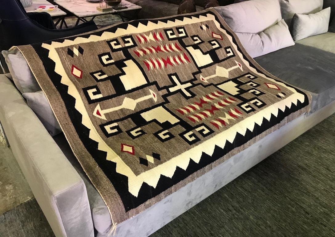A beautiful Native American Navajo crystal Region rug made from native wool, hand-carded, hand-spun, aniline dye, JB Moore variant, storm pattern.

JB Moore recognized the unique skill and artistry of the Navajo weaver and promoted them by