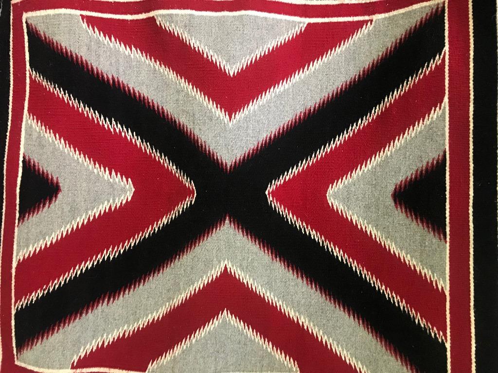 Fantastic geometric pattern of which the Navajo tribe is famed for. In fantastic vintage condition. Originally acquired some 60 years ago and placed in storage for good keeping. From a large Arizona collection of Native American artifacts and rugs