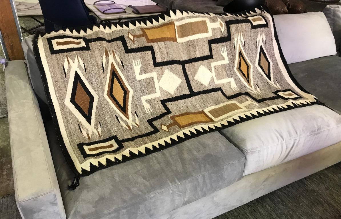 Whimsical design and geometric pattern of which the Navajo tribe is famed for. In fantastic vintage condition. Originally acquired some 50- 60 years ago and placed in storage for good keeping. From a large collection of Native American artifacts and
