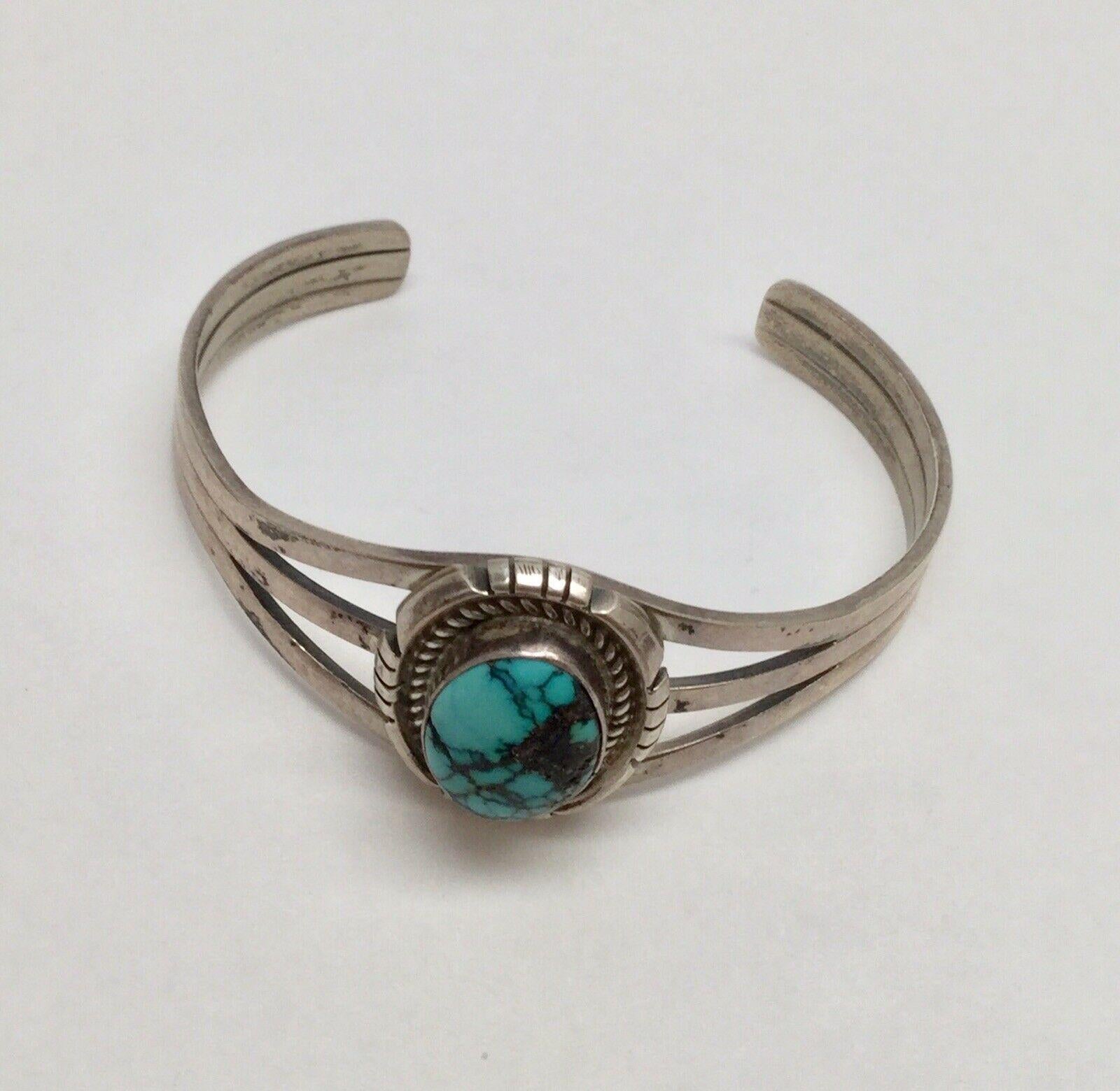 Native American Navajo Johnny Johnson sterling silver turquoise cuff bracelet.

Marked: JJ Sterling

Measures: 5 1/2