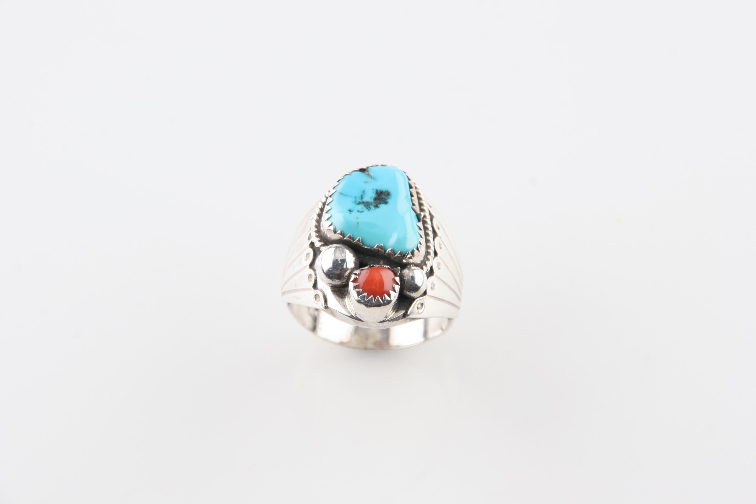 This is a very well made detailed Native American piece  by Navajo silversmith Herbert Joe.
The ring measures 3/4