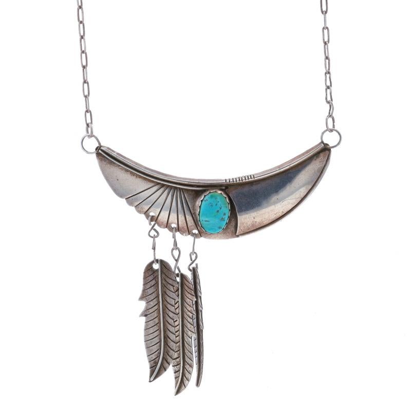 Native American
Tribal Affiliation: Navajo

Metal Content: Sterling Silver

Stone Information

Natural Turquoise
Treatment: Routinely Enhanced
Color: Greenish Blue

Style: Dangle
Chain Style: Flat Cable
Necklace Style: Chain
Fastening Type: Lobster