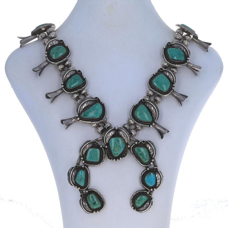 Native American
Artisan: (unsigned)
Tribal Affiliation: Navajo
Era: Vintage

Metal Content: Sterling Silver

Stone Information
Natural Turquoise
Treatment: Routinely Enhanced
Color: Green & Greenish Blue

Necklace Style: Beaded Wire
Fastening Type:
