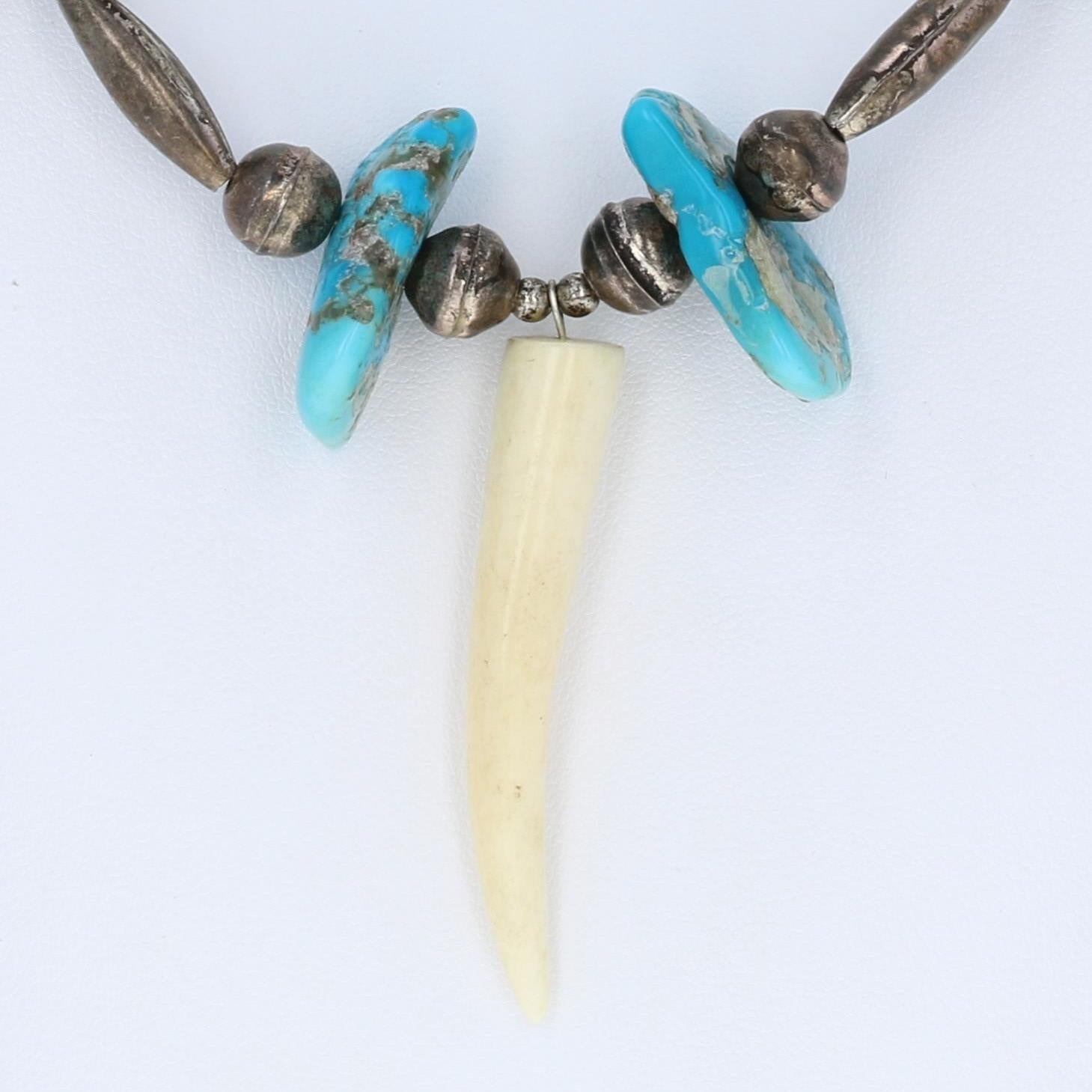 Native American 
Metal Content: Guaranteed Sterling Silver as tested

Stone Information:
Genuine Turquoise - 
Treatment: Routinely Enhanced

Genuine Shell - 

Genuine Coral -

Material Information:  
Deer Bone - 

Deer Antler - 

Chain Style: Beaded