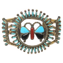 Bracelets manchettes papillon avec incrustation de turquoise et point de croix amérindien