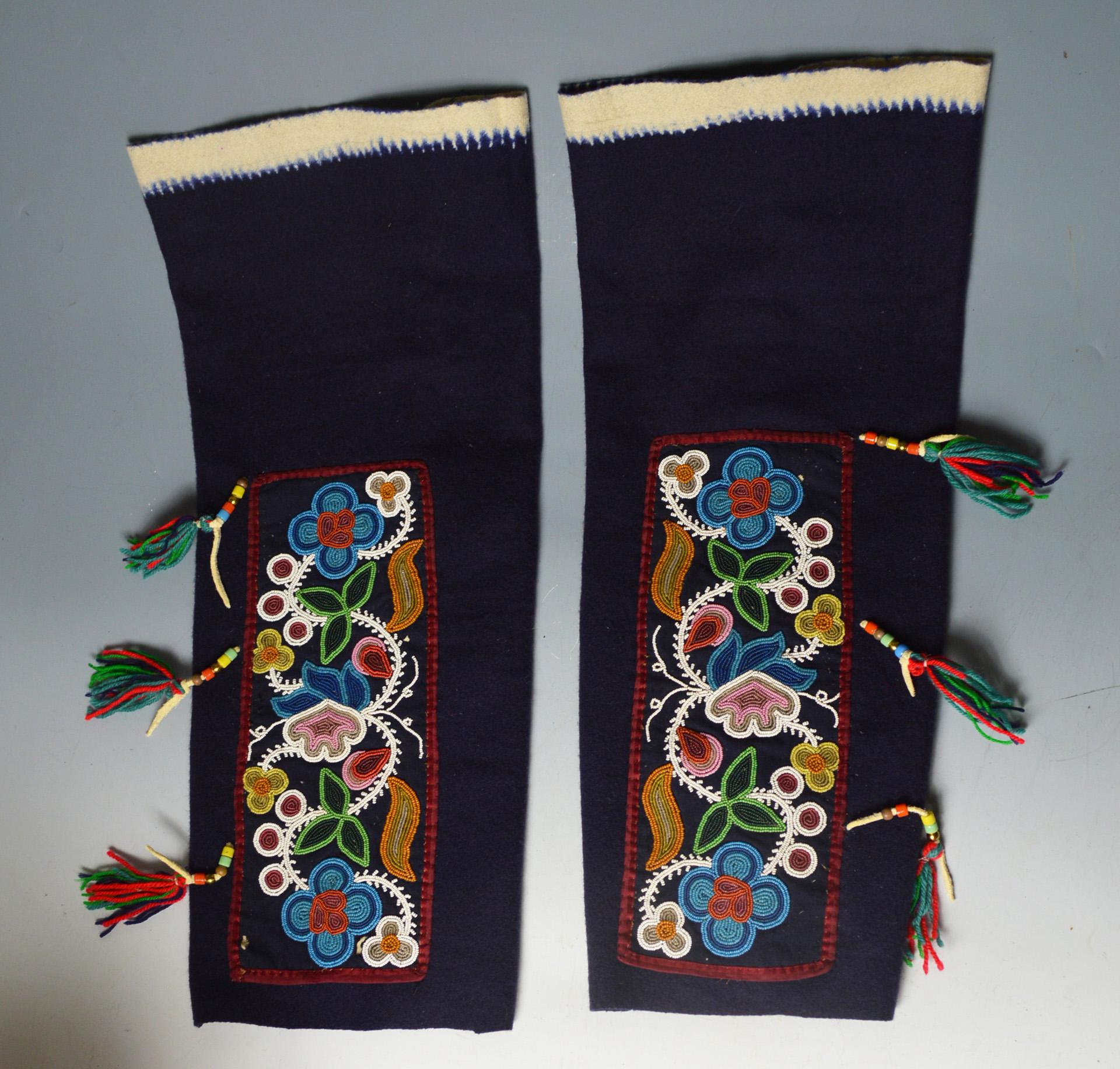 Native American Ojibwa or woodlands Cree Leggings
A very fine pair of Native American leggings in wool with applied beaded sections 34 x 13 cm (circa 1890 ) sewn to later leggings circa 1930s 
leggings length 24 inches 61 cm
Condition : fine.