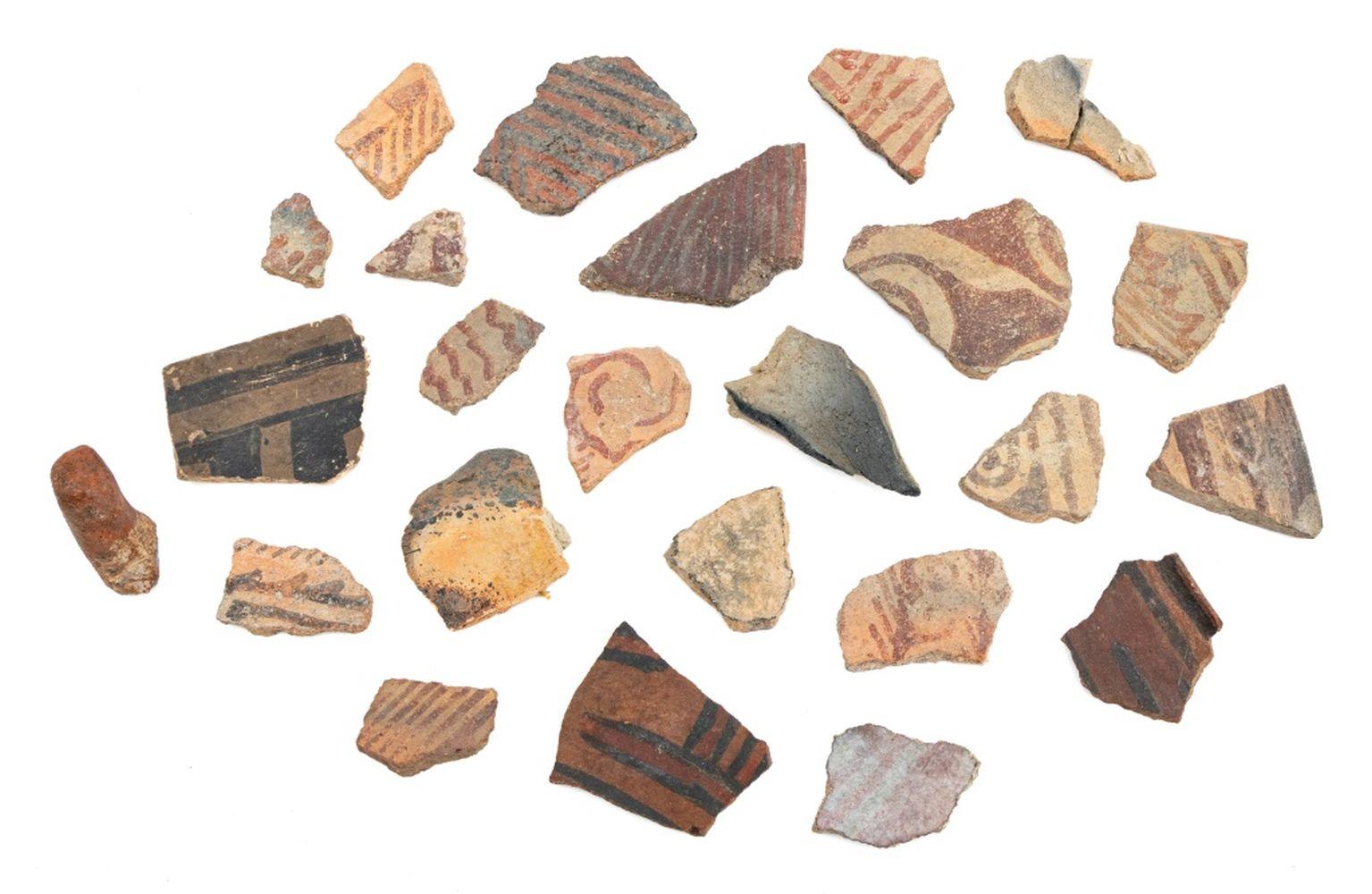 Collection of Native American Pottery Sherds and Vessels, 20th Century and earlier, comprising: a blackware jar (with chip to rim), a carved San Juan Pueblo redware wedding vase (prior repair to handle and losses to spout), a Santo Domingo basket