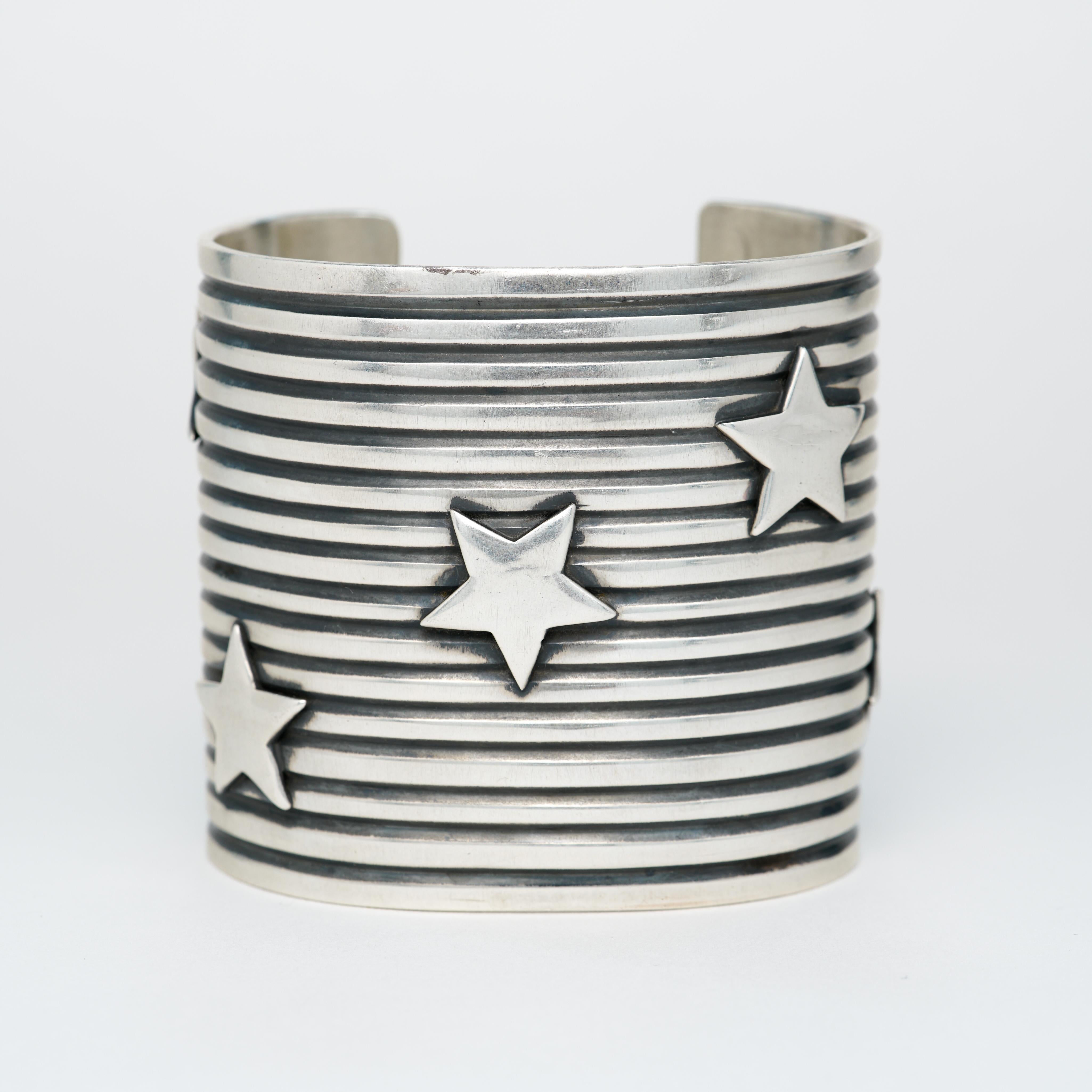Native American Signed A. Cadman Wide Silver Cuff
Andy Cadman

Heavy Substantial and wide. Amazing statement cuff.

H 57.63mm x W 62.84
123 grams