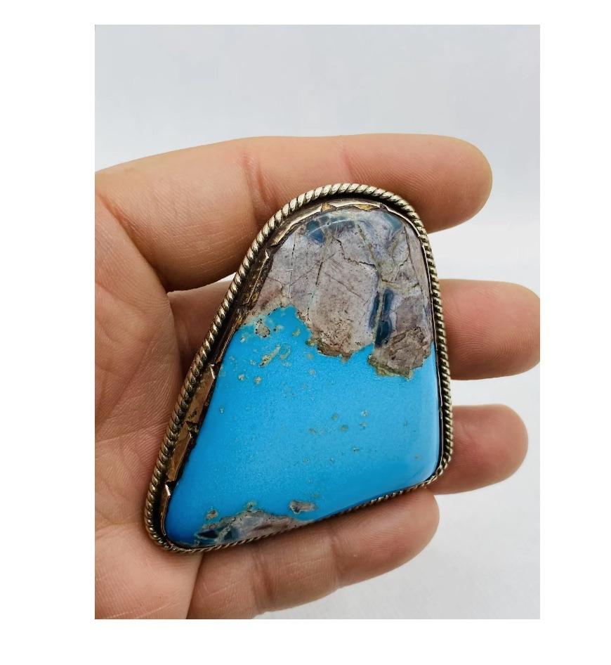 Native American Silver Large Turquoise Brooch Pendant

Consistent with age and use please see the photos for condition
Please ask for more photos if you need we will send them with in 24-48 hours

Due to the item's age do not expect items to be in